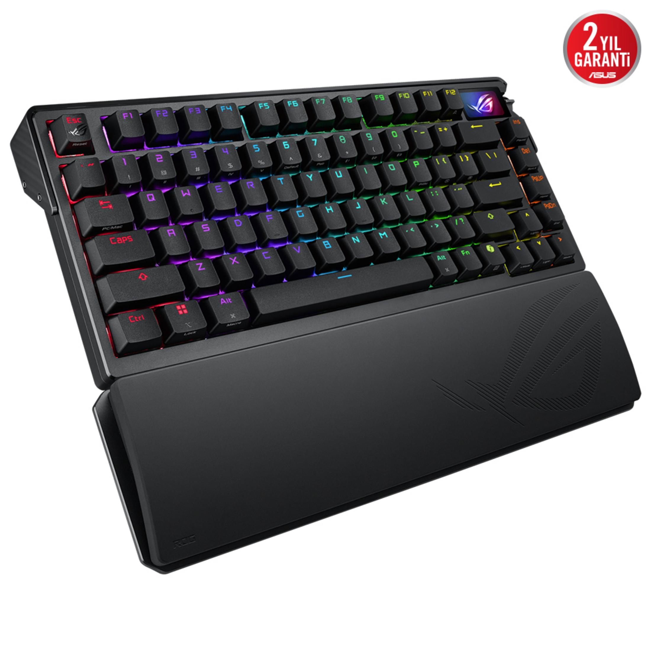 Tastiera meccanica nera con illuminazione RGB e poggiapolsi.