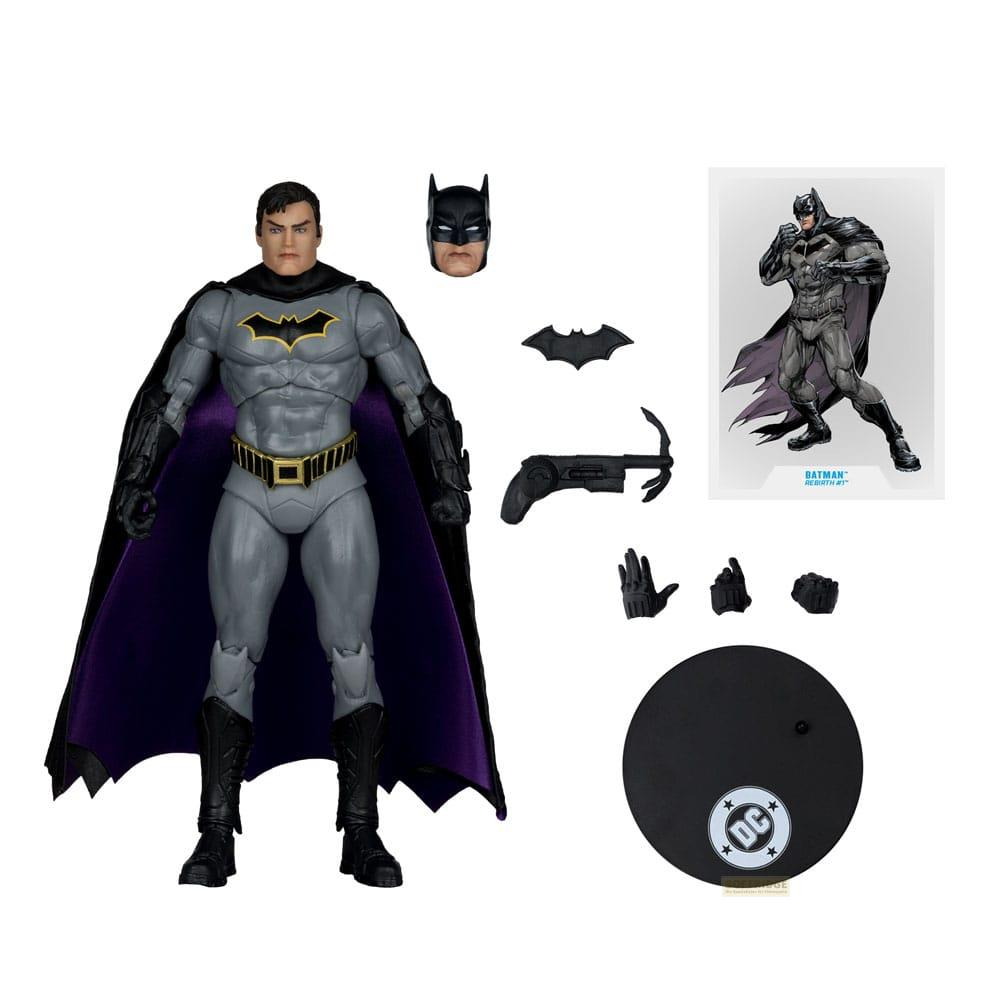Action figure di Batman grigia e viola con accessori, testa e batarang inclusi.