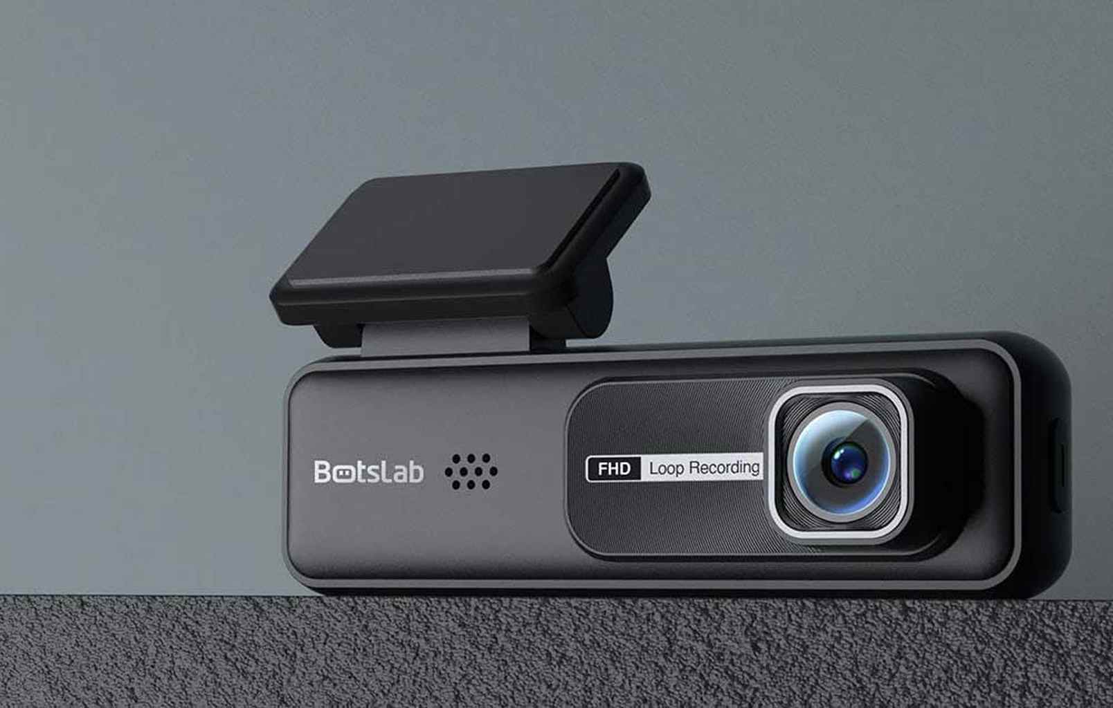 Een zwarte dashboardcamera met FHD-lusopname.