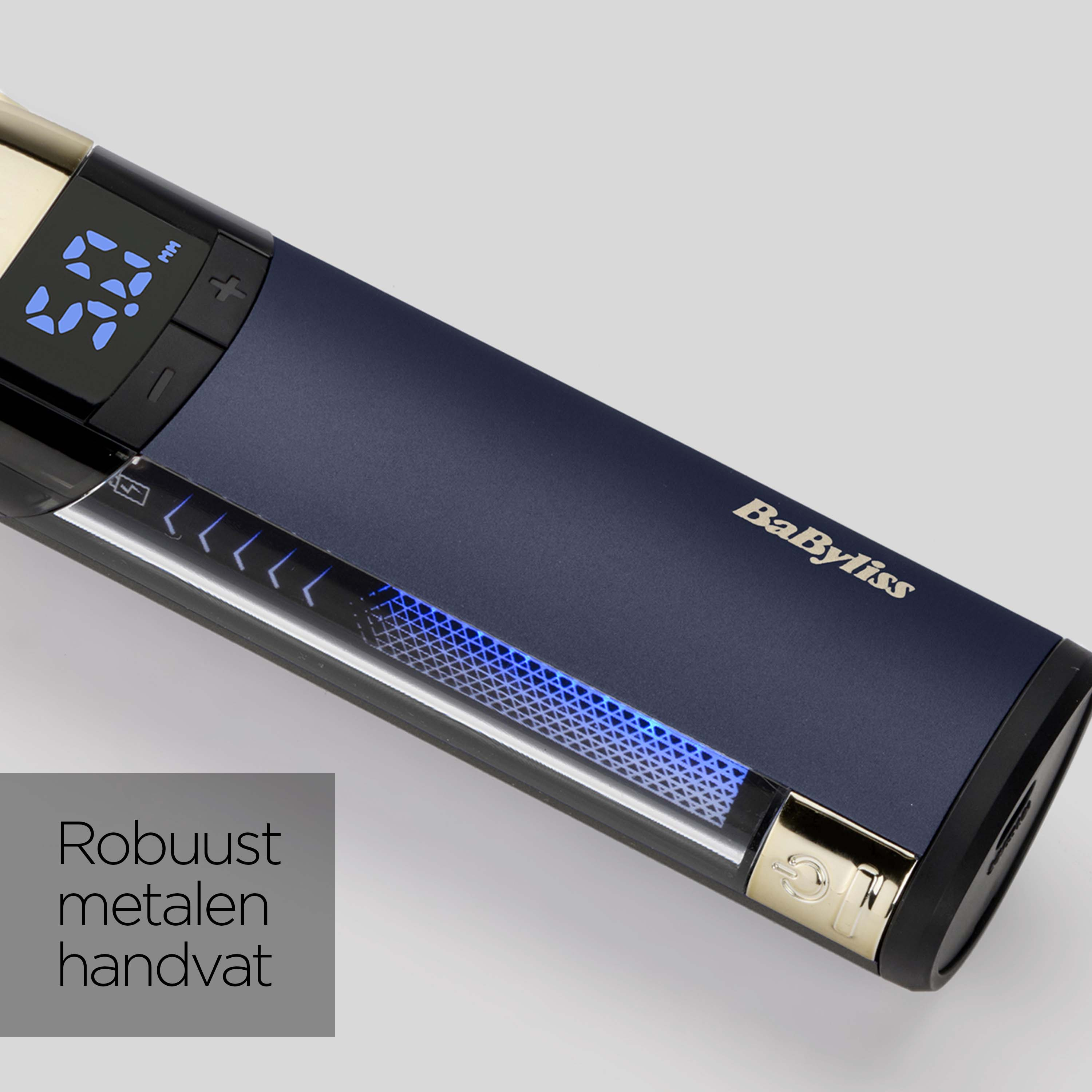 Dark blue hair clipper with digital display and lighting.