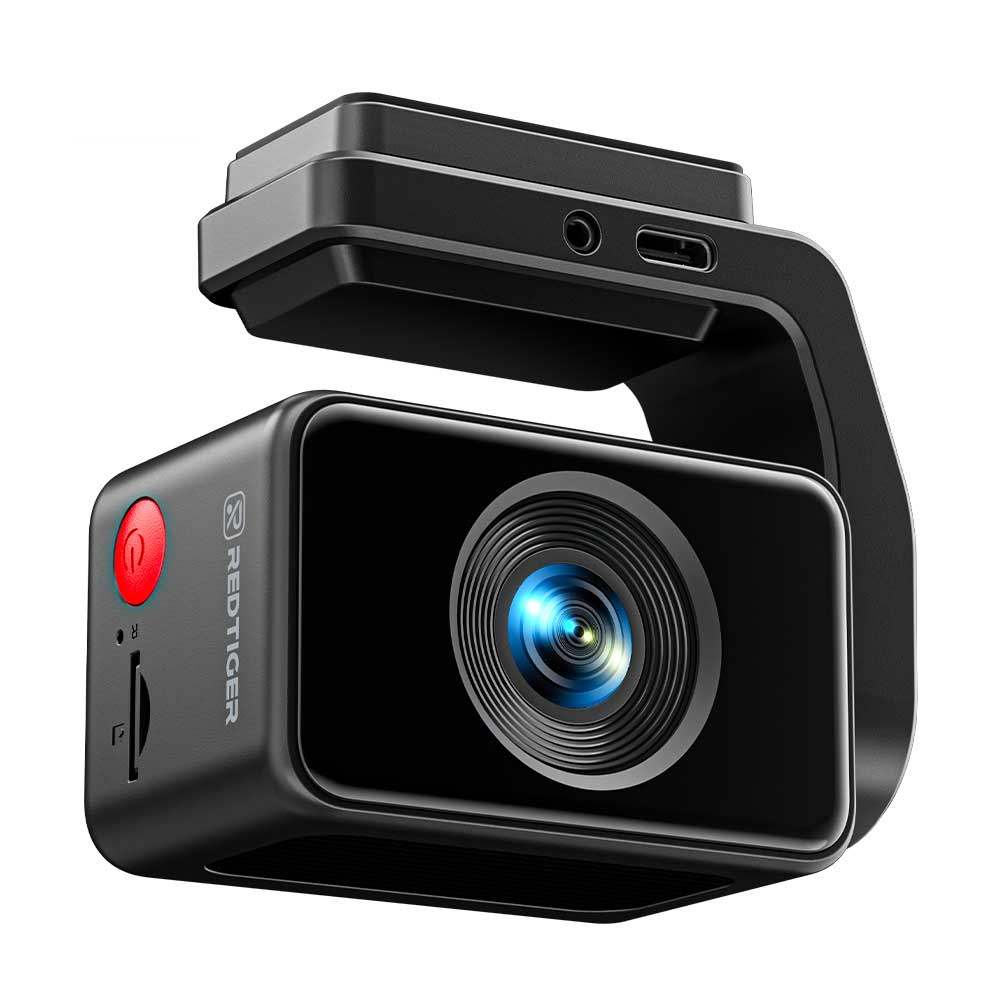 Een zwarte dashcam met rode aan/uitknop en blauwe lens.
