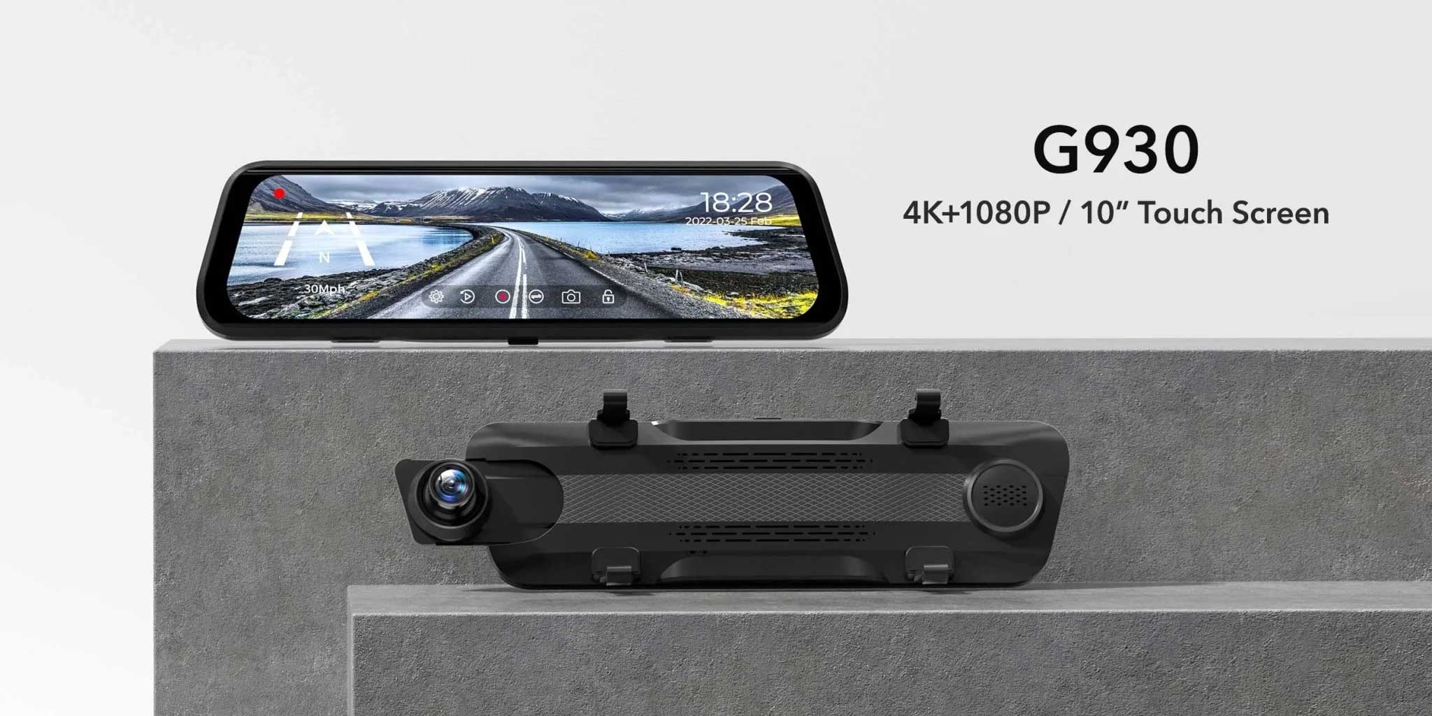 Een zwarte dashcam-recorder met 10-inch touchscreen die een bergachtig landschap toont.