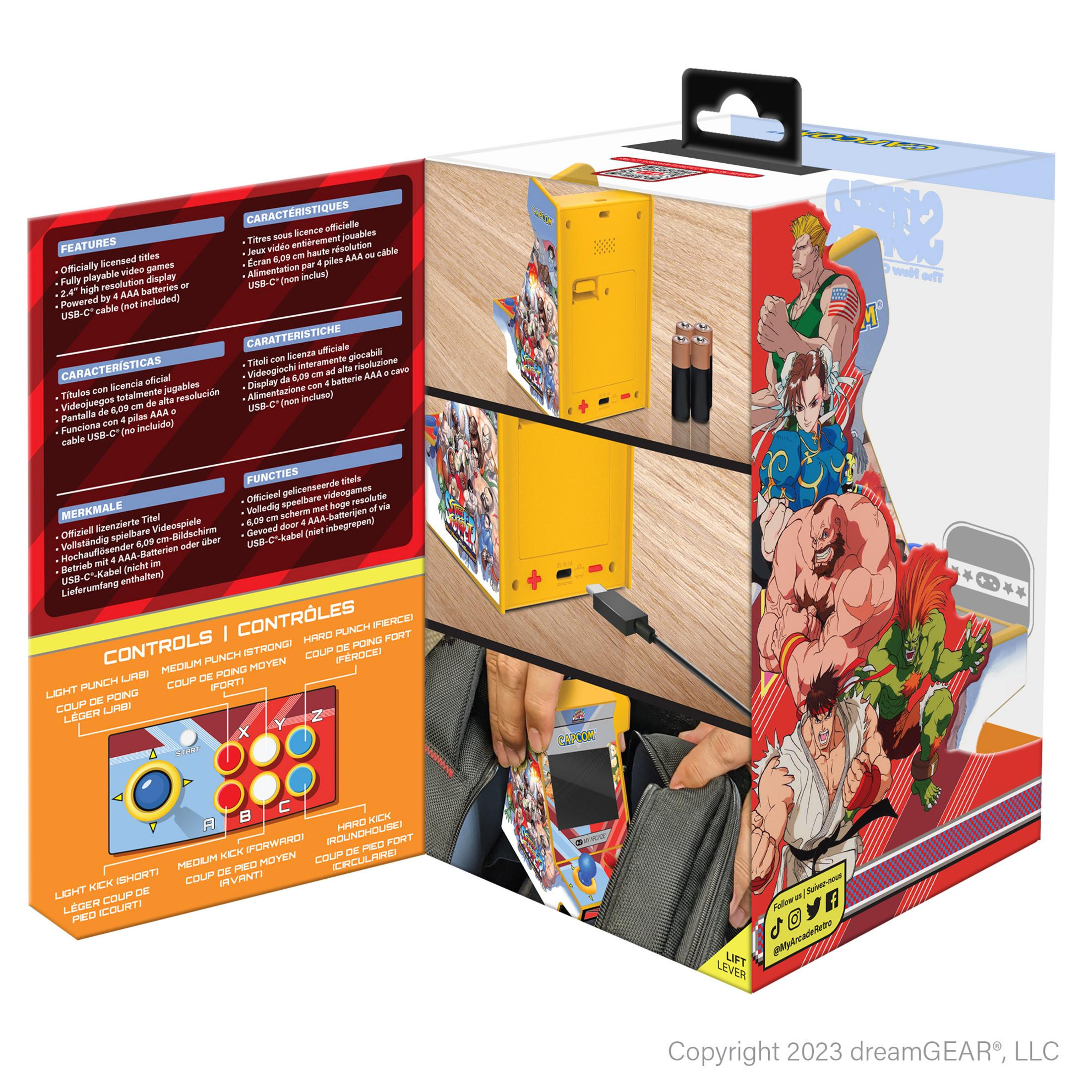 Żółta mini konsola z grami zręcznościowymi z postaciami Street Fighter i joystickiem. Baterie w zestawie.