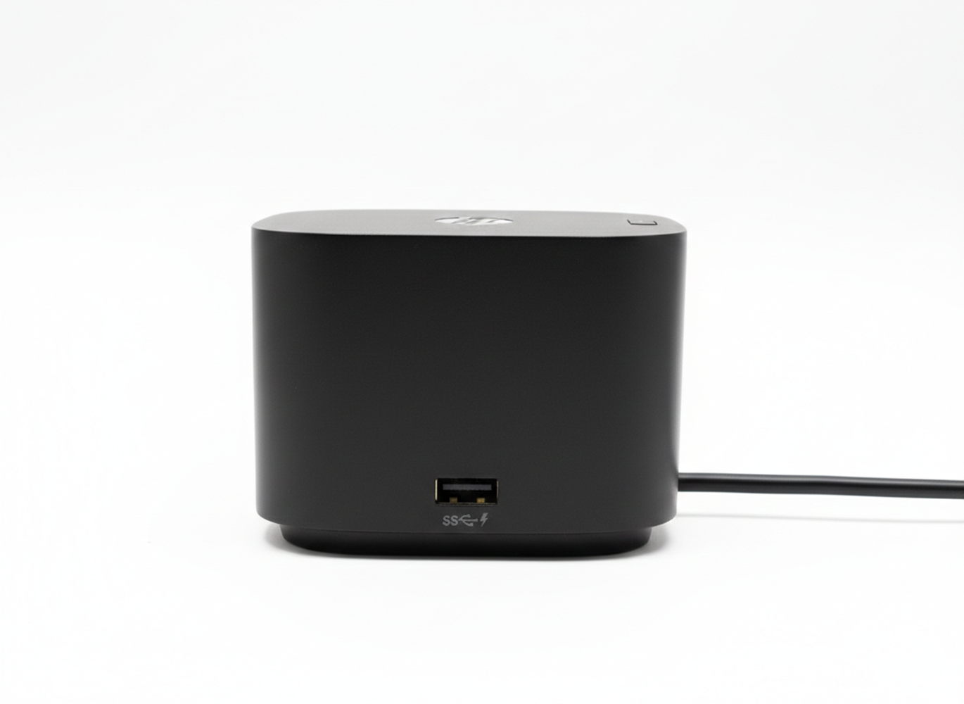 Ein schwarzer HP Docking-Würfel mit einem USB-Anschluss und einem Stromkabel.