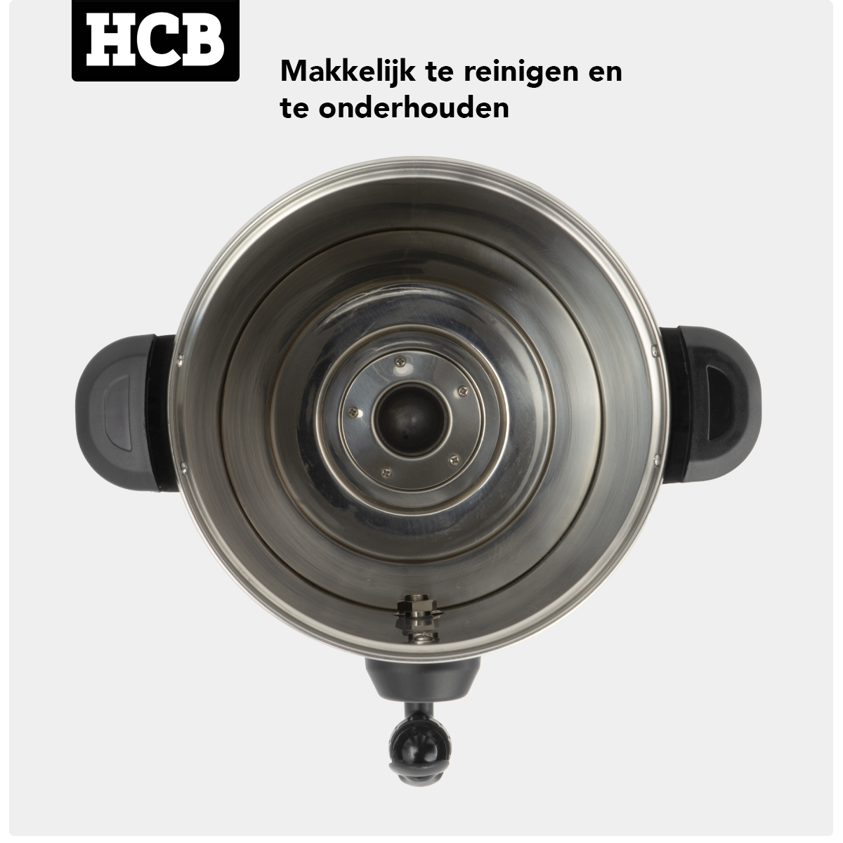 Bovenaanzicht van een zilverkleurige waterkoker met zwarte handvatten.