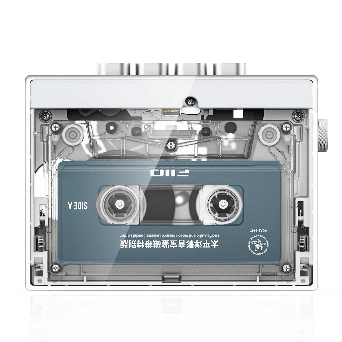 Meccanismo lettore di cassette bianco con coperchio trasparente e cassetta blu.