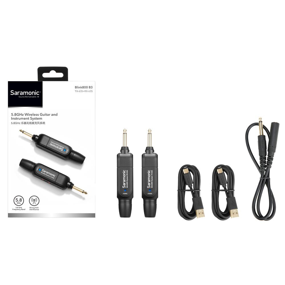 Un sistema inalámbrico negro para guitarra e instrumento con transmisores, cables y embalaje.