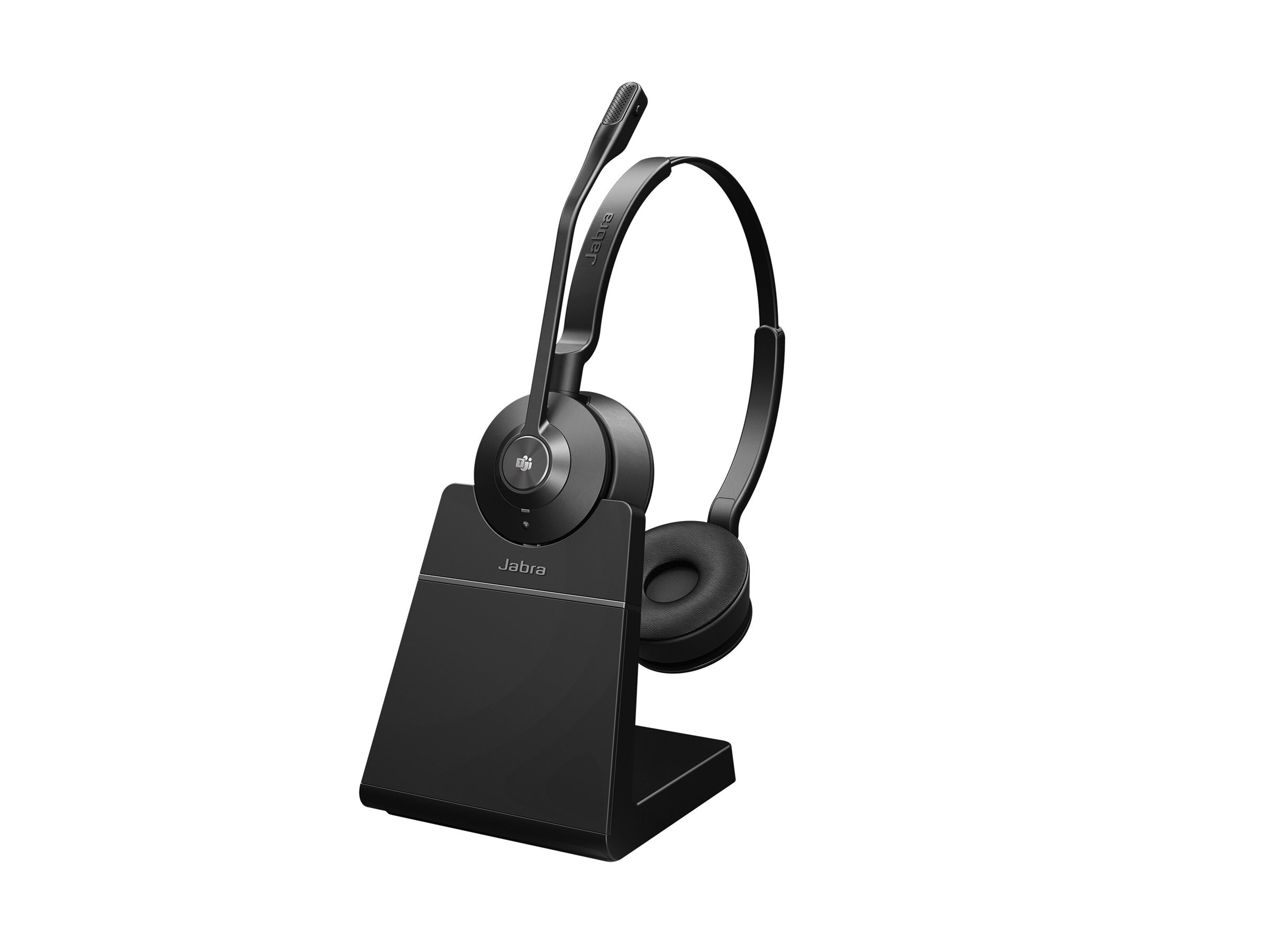 A black Jabra headset with a microphone sits on its charging base.