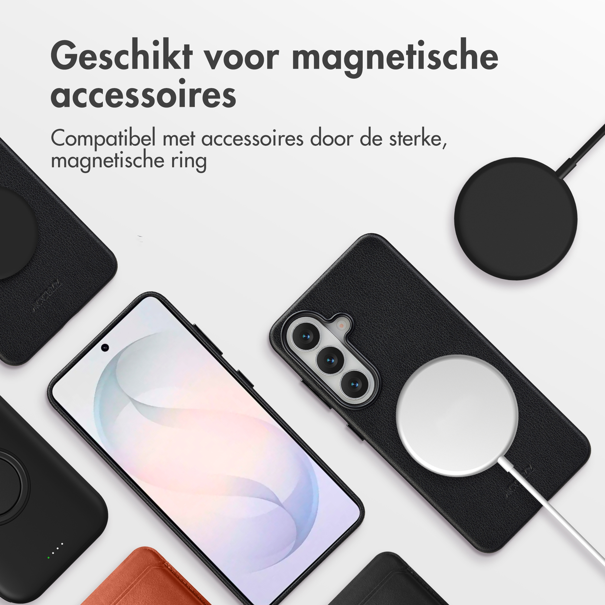 Zwarte telefoonhoes met witte magnetische oplaadcirkel en kabel.