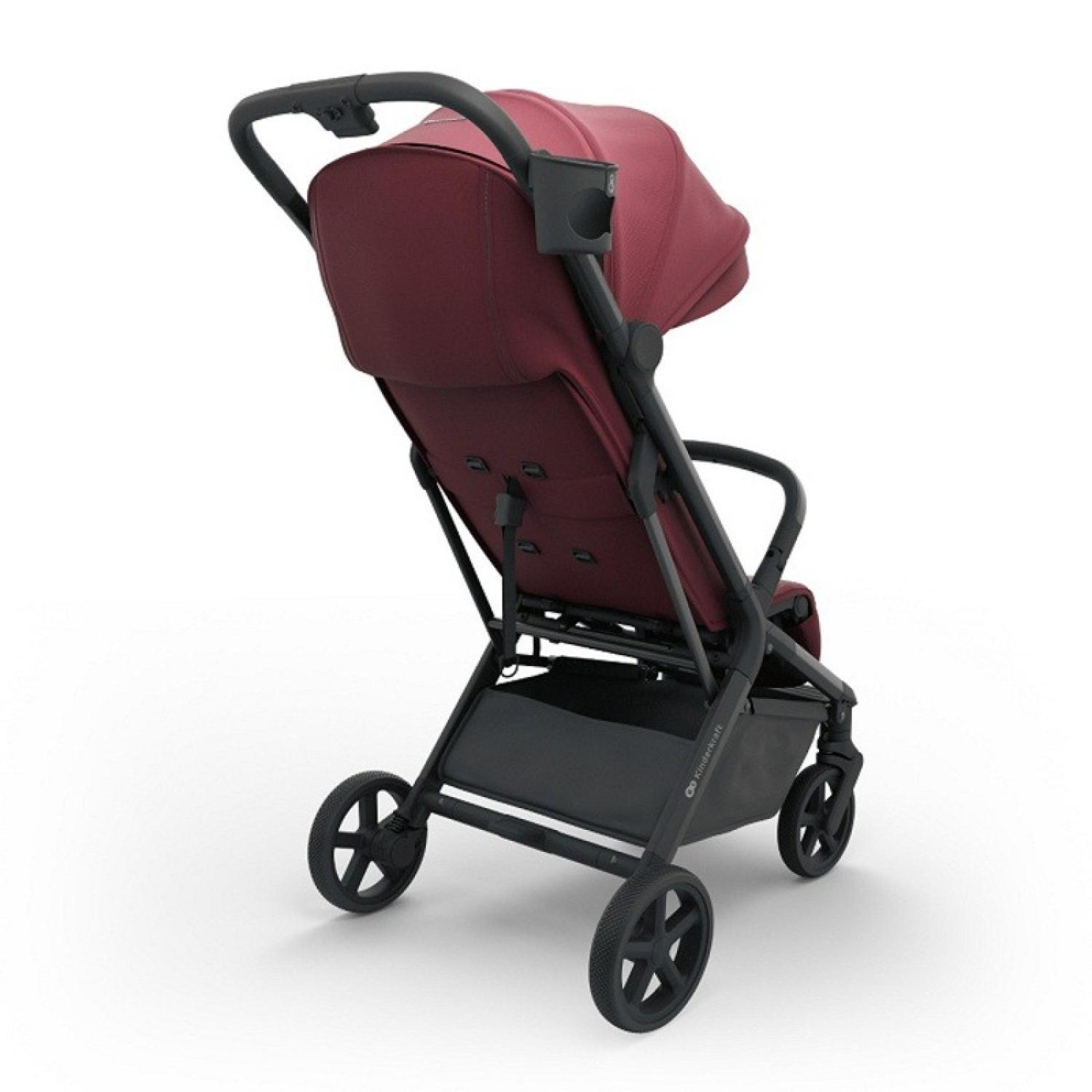 Ein burgunderroter Kinderwagen mit schwarzem Gestell und Einkaufskorb.