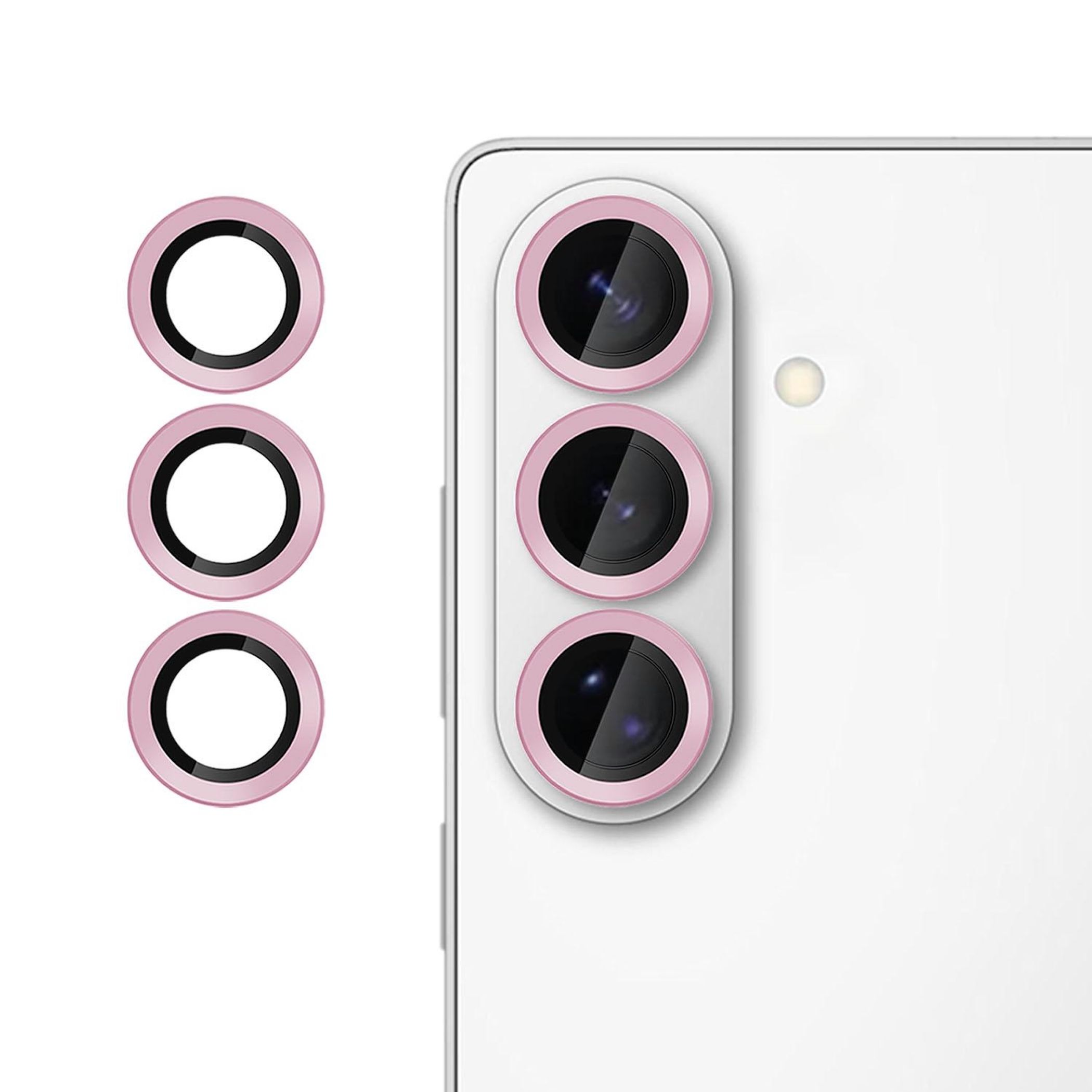 Tre anelli rosa per fotocamera e tre su una custodia bianca per smartphone.