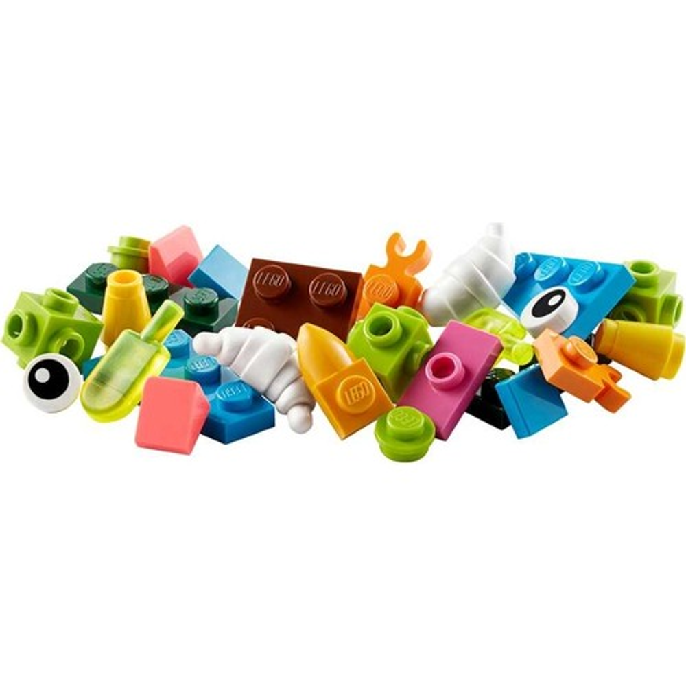 Göz, kruvasan ve sarı parçalar dahil çeşitli LEGO tuğlaları.