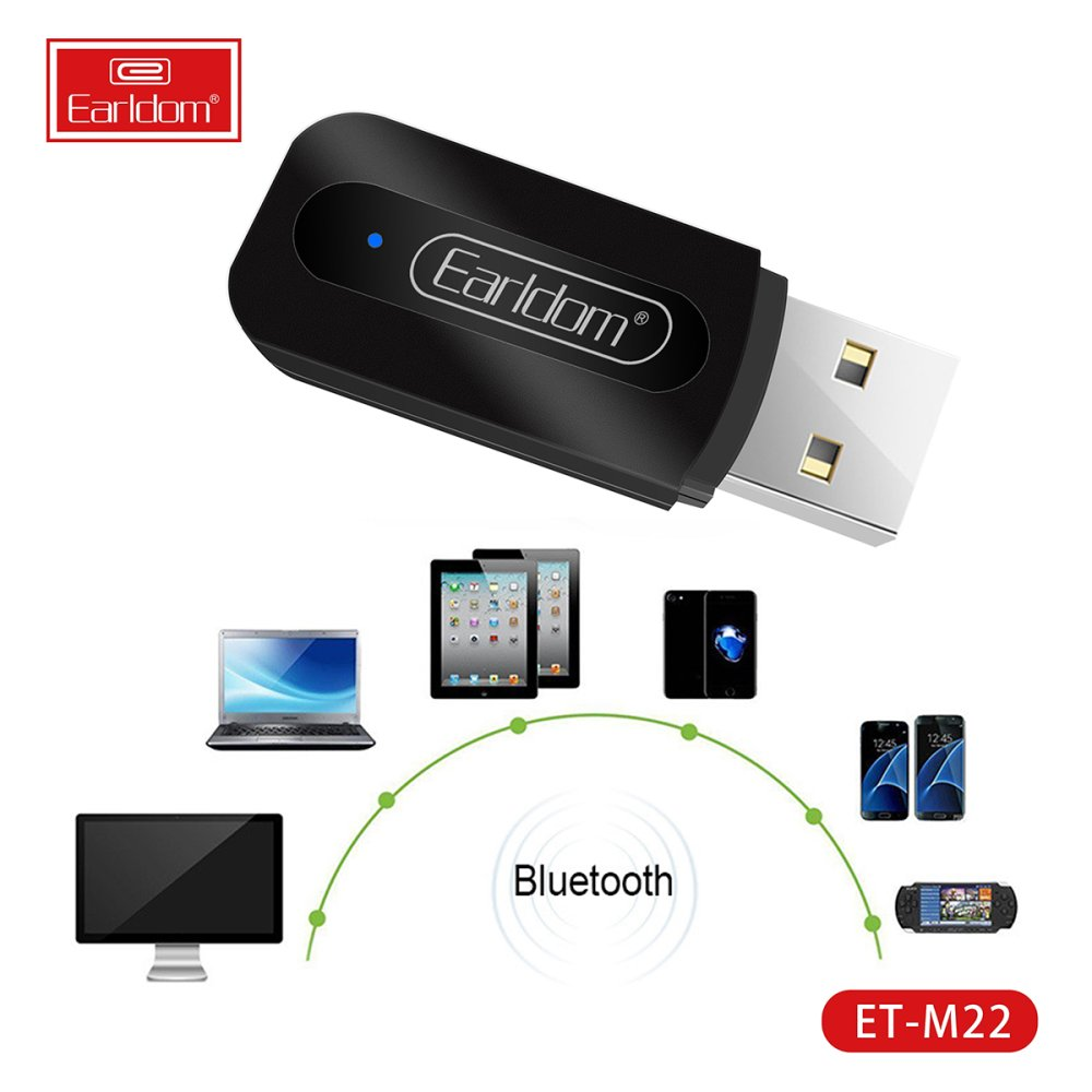 USB'li siyah Bluetooth adaptörü, çeşitli cihazlarla çevrili.