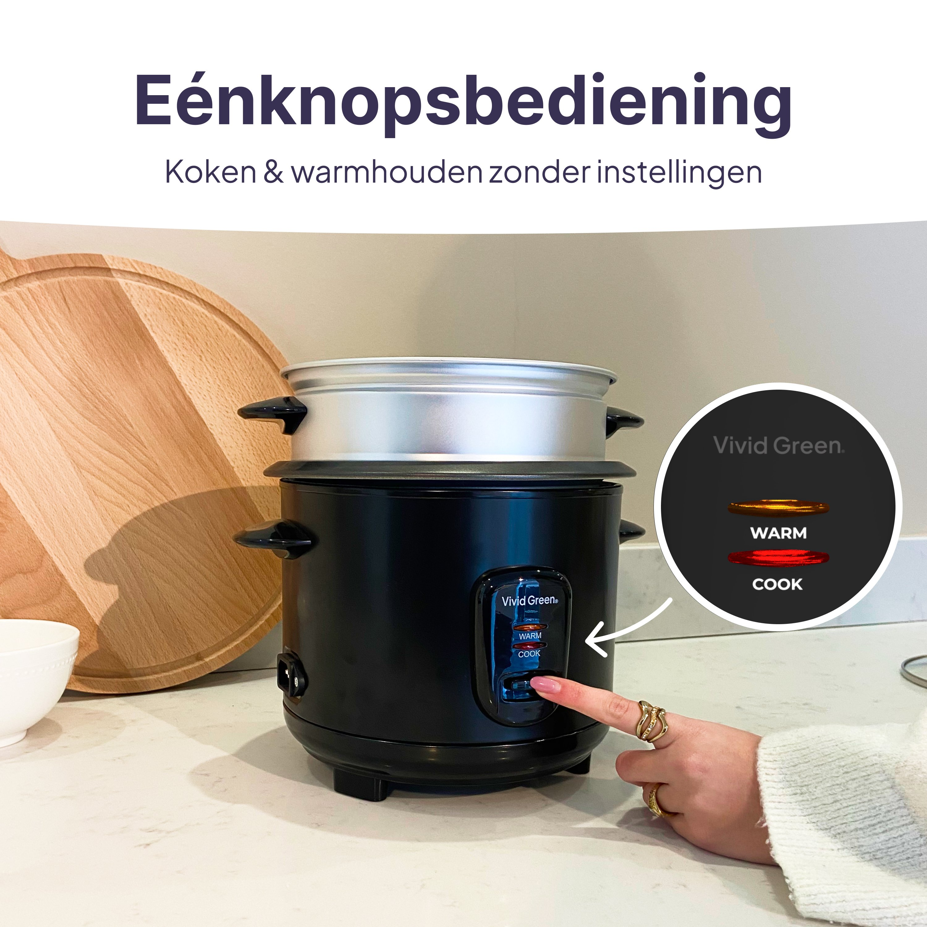 A black rice cooker with a control panel showing 'Warm' and 'Cook' modes.