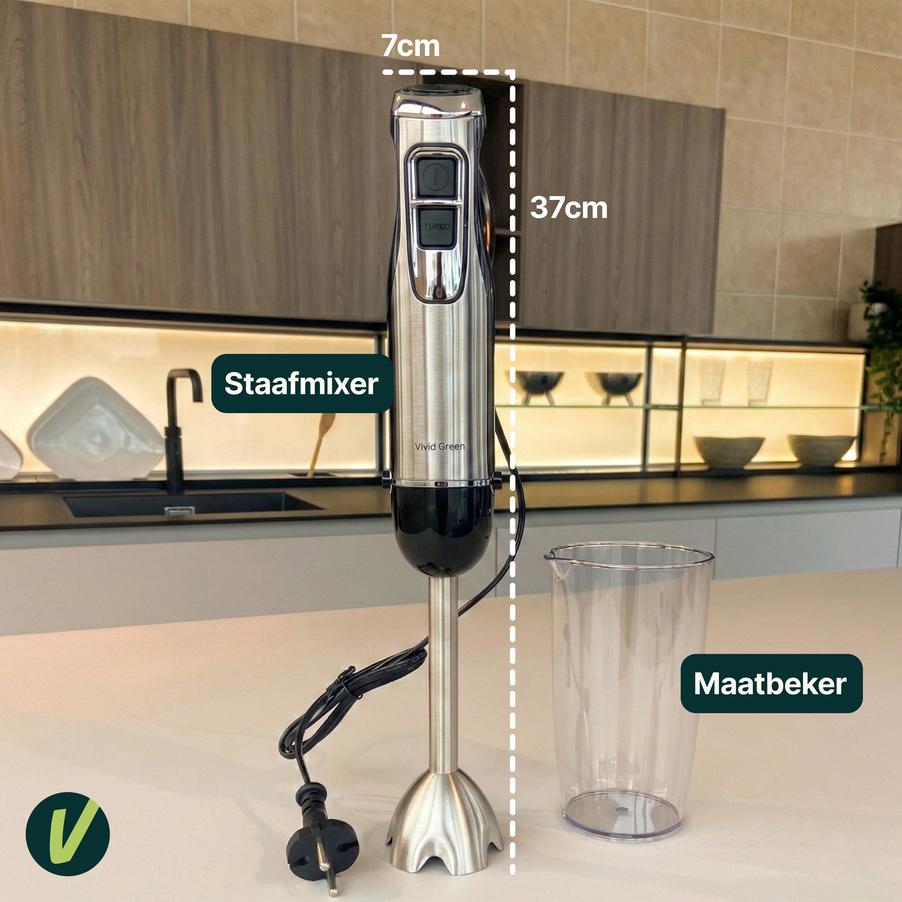 A silver immersion blender with black handle and cord next to a measuring cup.