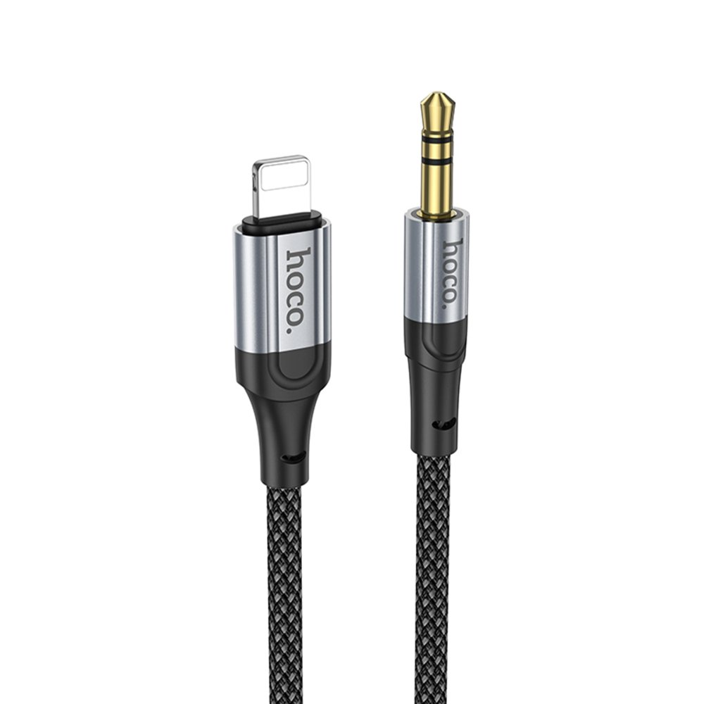 Un cavo audio intrecciato nero con un connettore Lightning argentato a sinistra e un jack da 3,5 mm con punta dorata a destra.