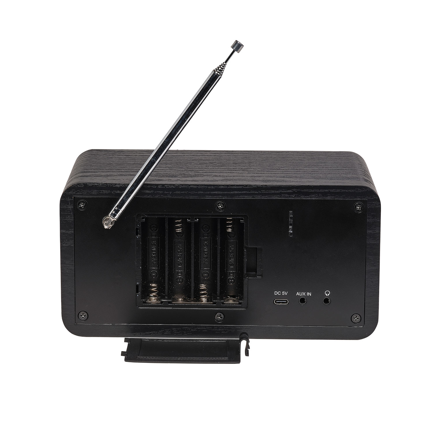 Back of a black radio with extended antenna, battery compartment, and ports.