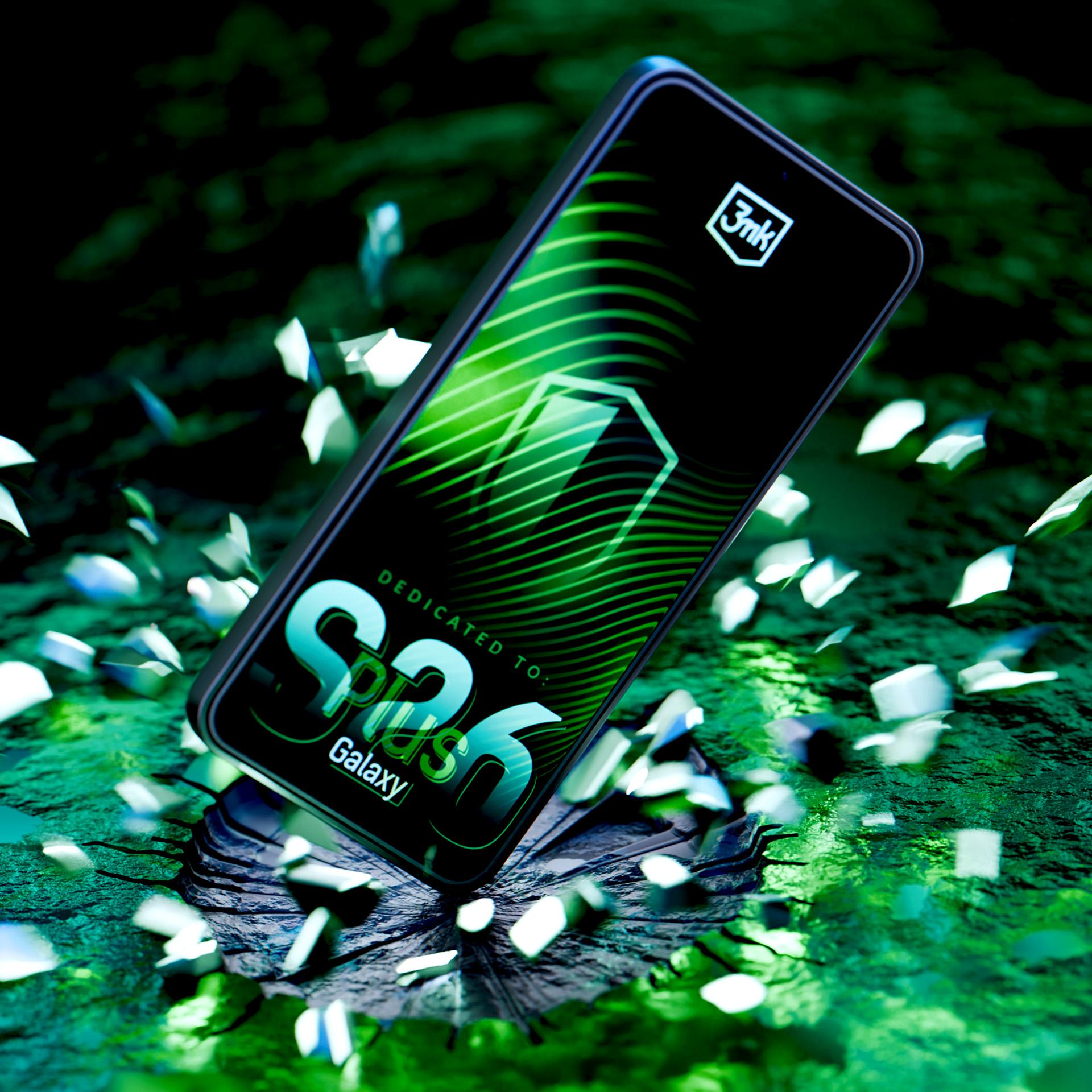 Smartfon z zielonym wyświetlaczem ładowania spada na potłuczoną powierzchnię.