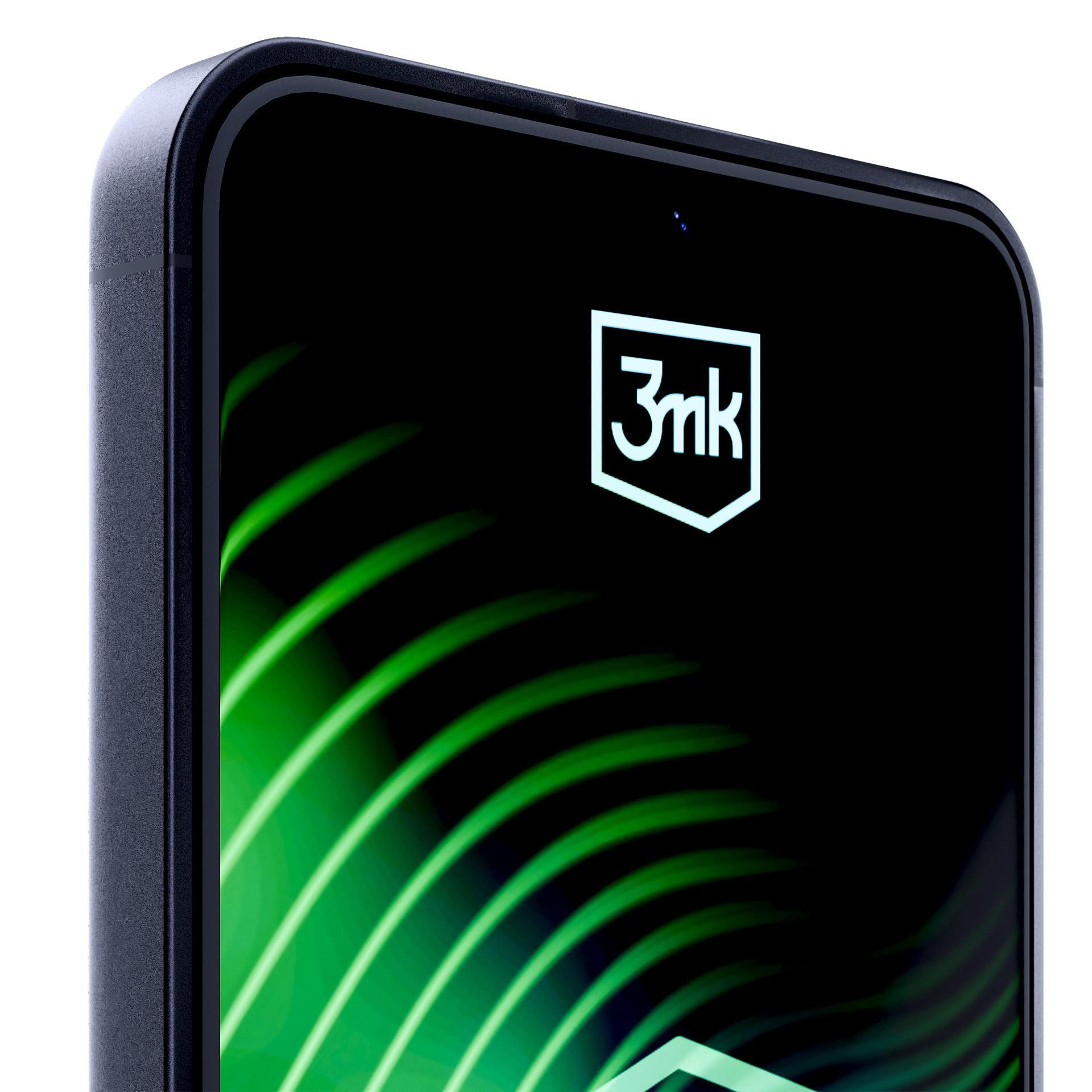 Zbliżenie ekranu czarnego smartfona z białym logo '3mk' i świecącymi zielonymi, falistymi liniami na ciemnym tle.