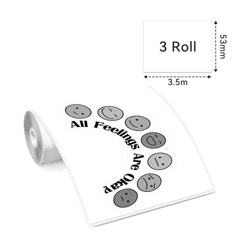 Eine Rolle weißer Aufkleber mit grauen Smiley-Gesichtern und dem Text „All Feelings Are Okay“ in einem Halbkreis.