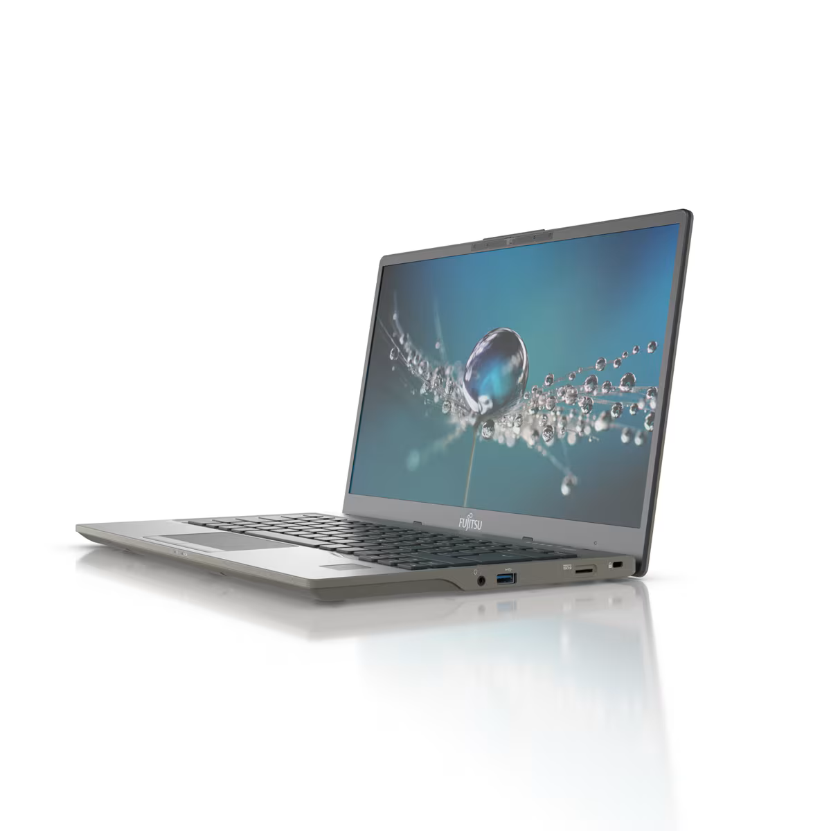 Ein offener grauer Laptop mit einem Bild von Wassertropfen auf einer Pusteblume auf dem Bildschirm.