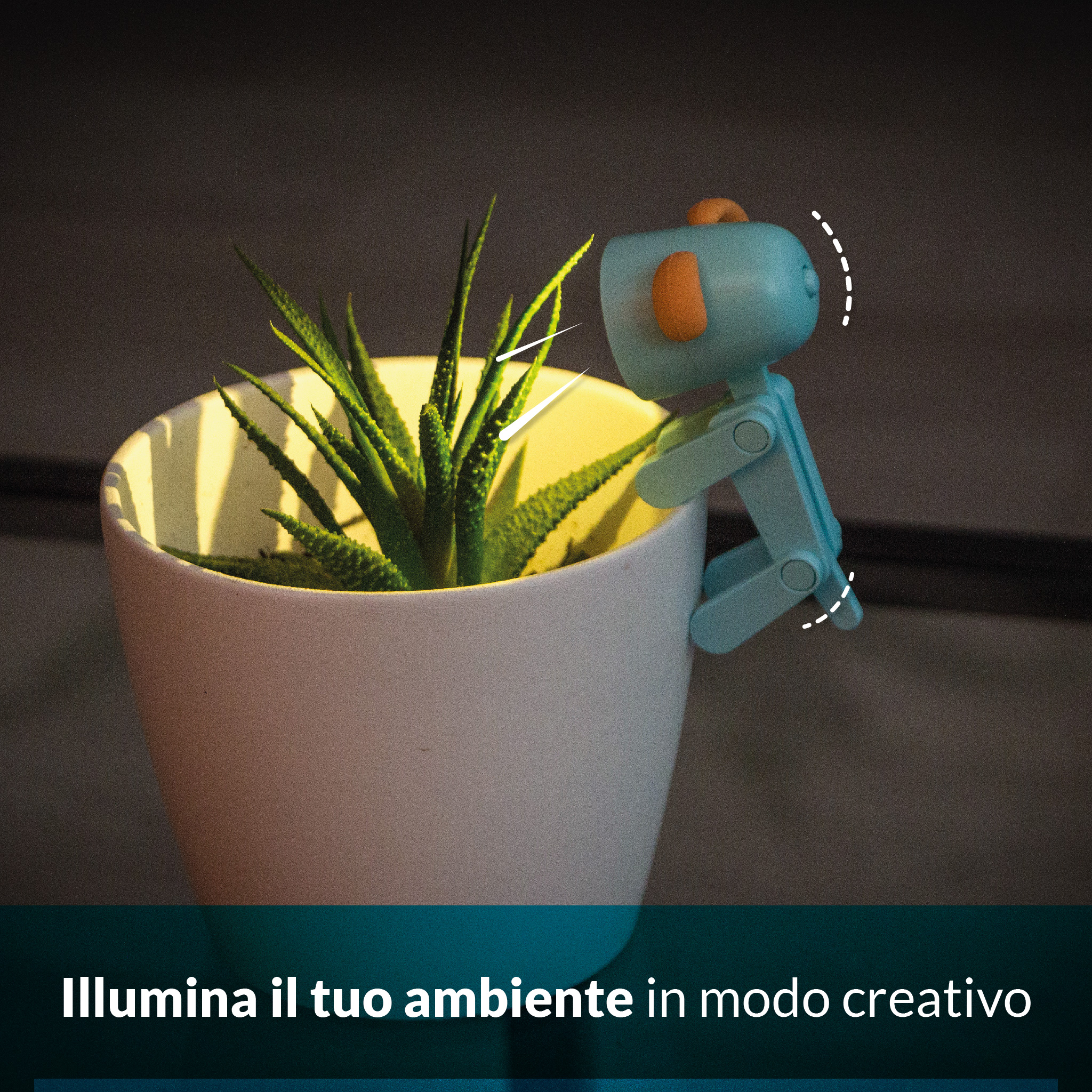 Un robot blu è appeso a un vaso con una pianta verde.