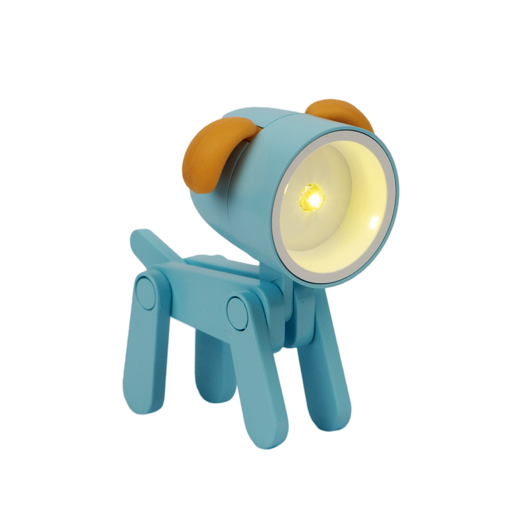 Una lampada blu a forma di cane con orecchie arancioni e occhio acceso.