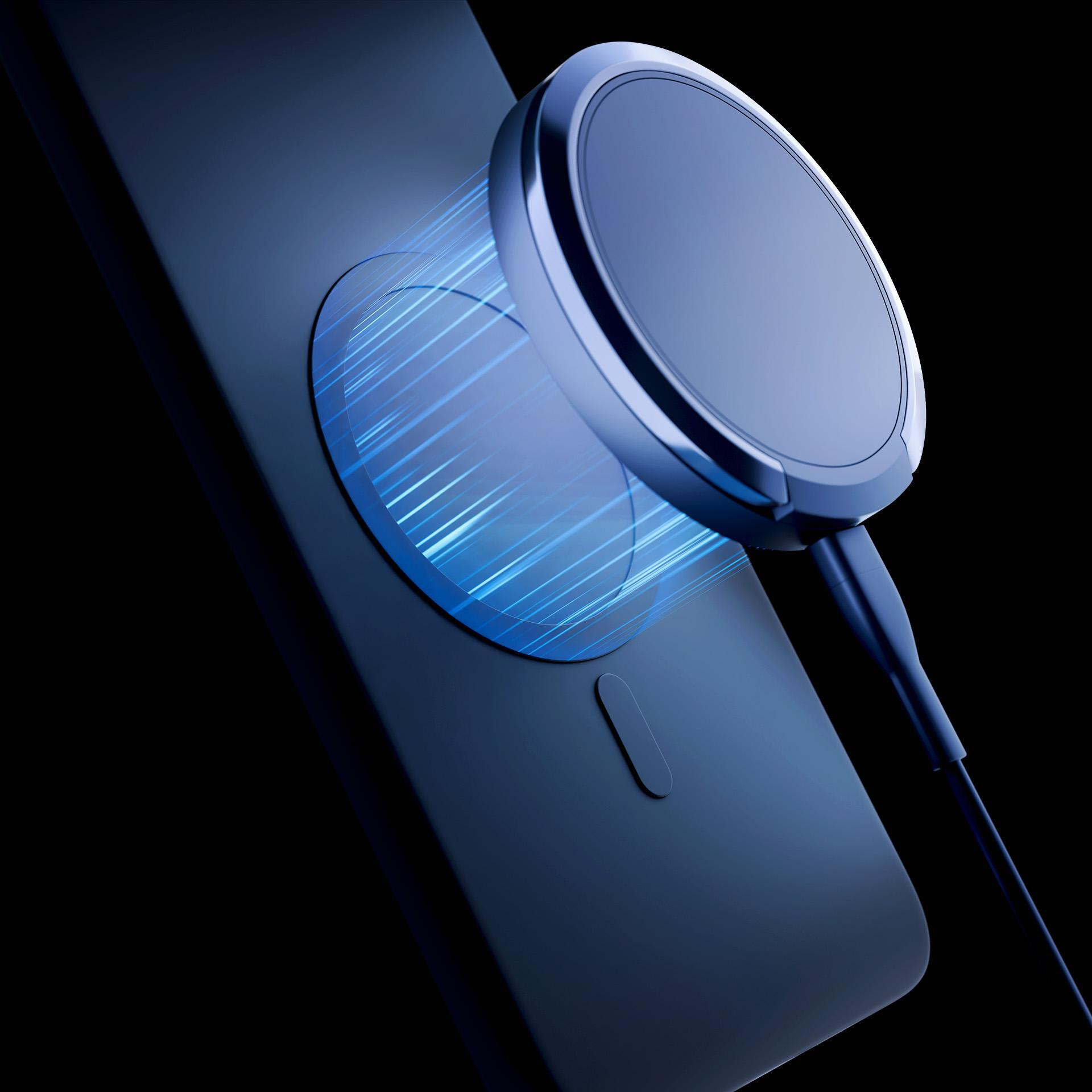 Magnetyczna ładowarka łączy się z ciemnym smartfonem, niebieskie efekty energetyczne.