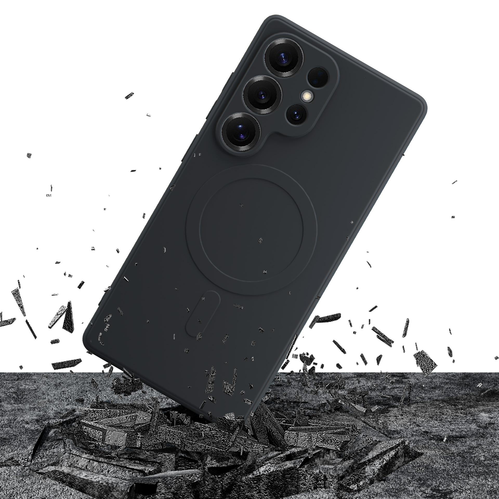 Czarny smartfon z aparatami spada na gruzy.