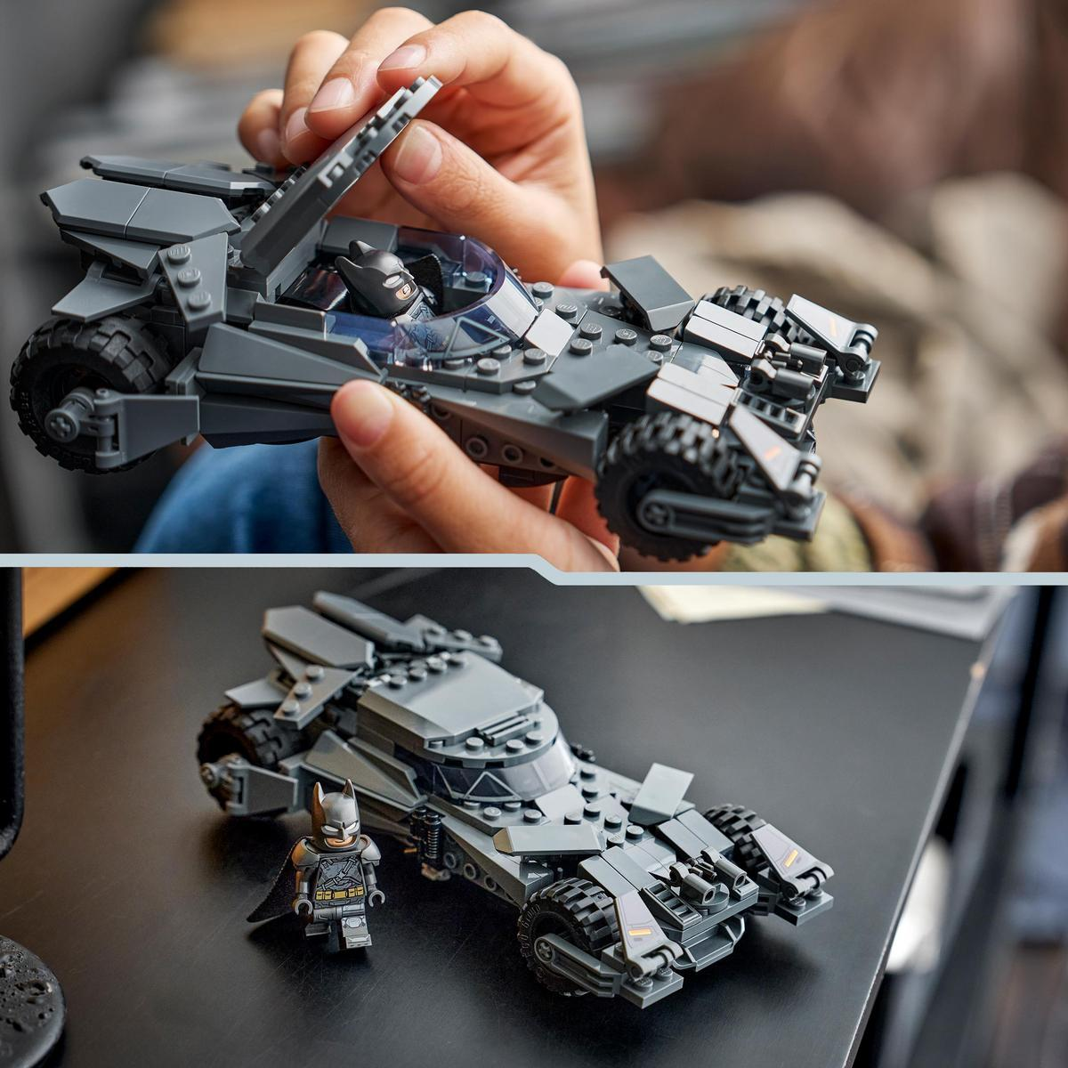 Un Lego Batman e la sua Batmobile su un tavolo.