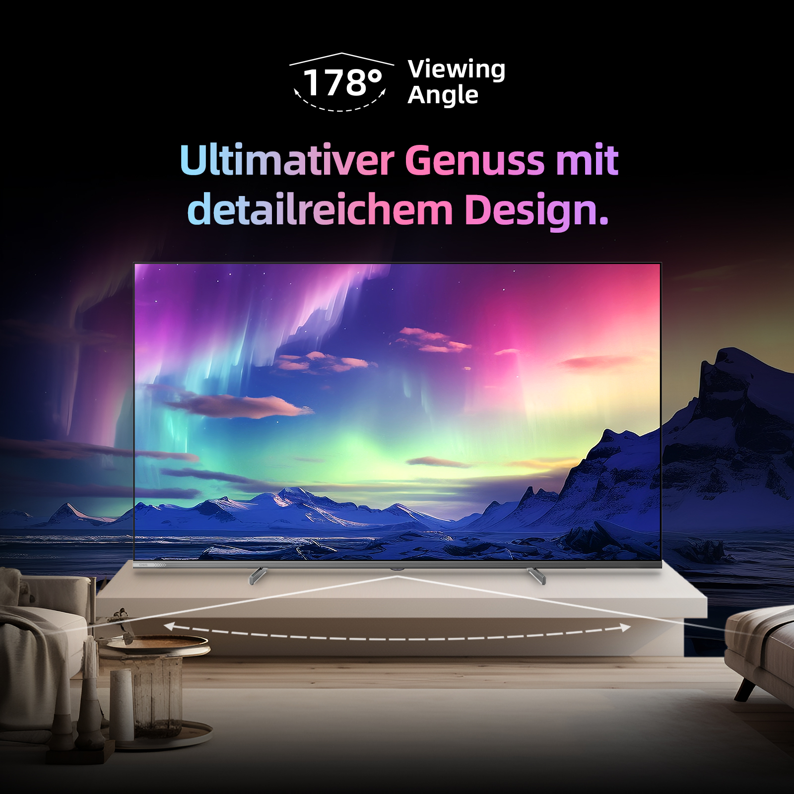 Ein moderner Fernseher zeigt eine Nordlicht-Landschaft mit Bergen und Schnee.