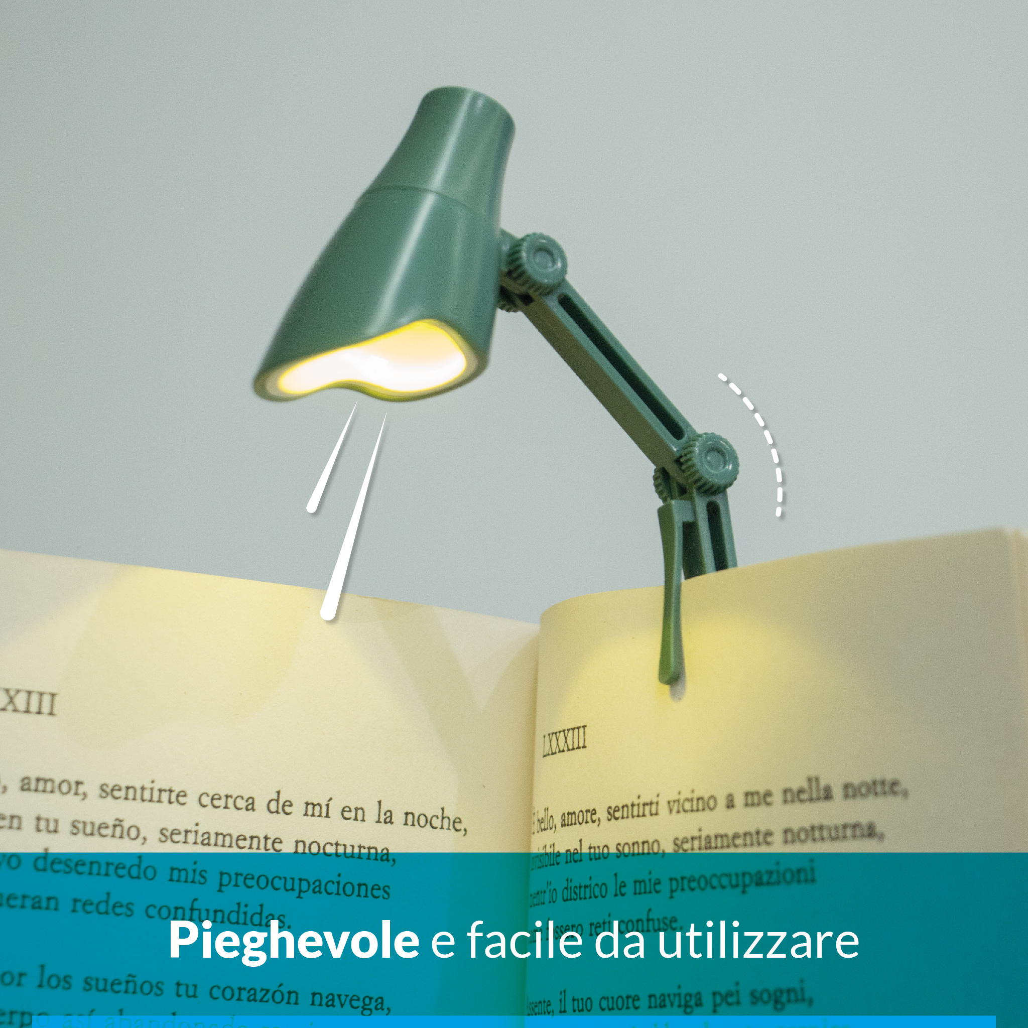 Lampada da lettura verde agganciata a un libro aperto. Luce brillante illumina le pagine.