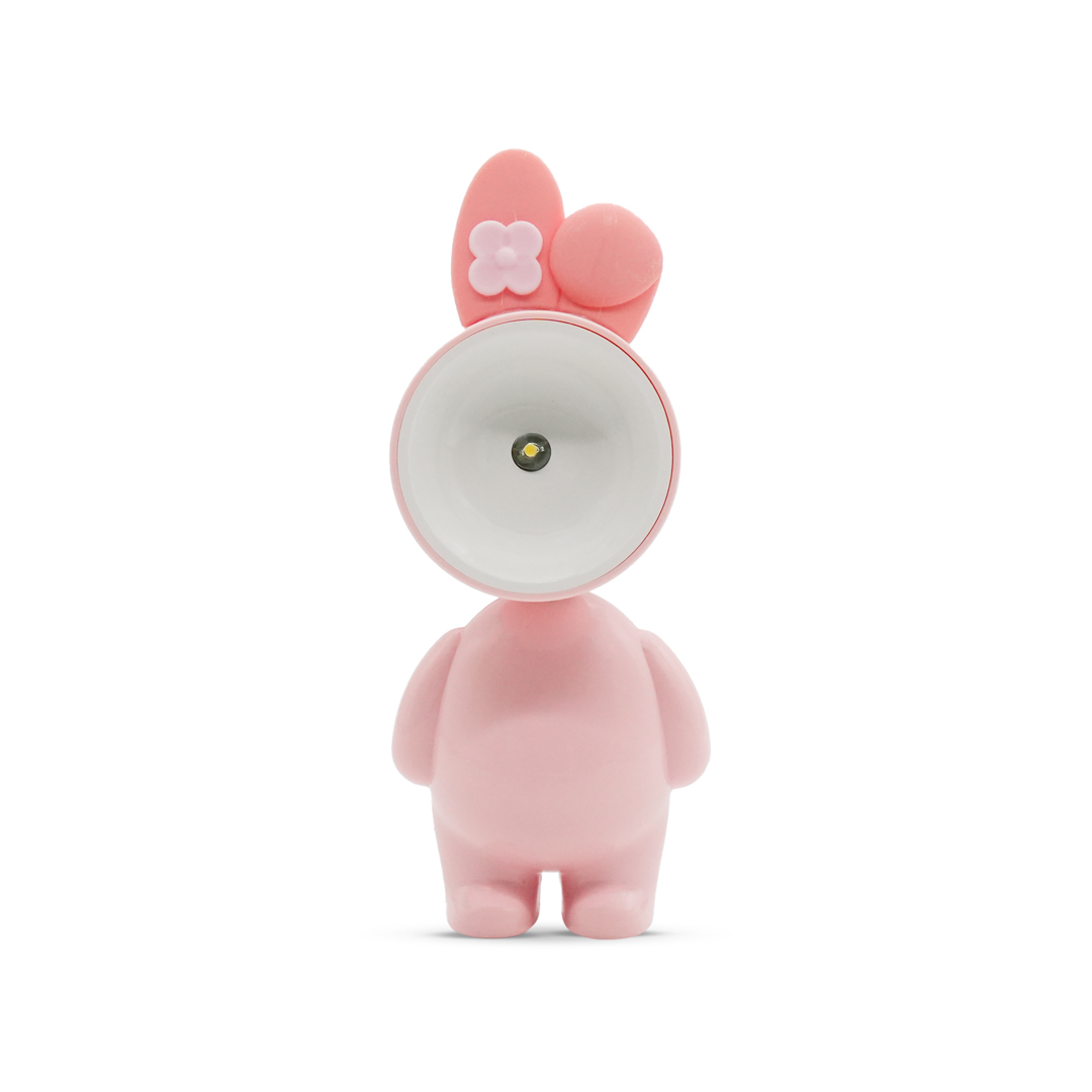 Una lampada rosa a forma di coniglietto con orecchie e fiore.