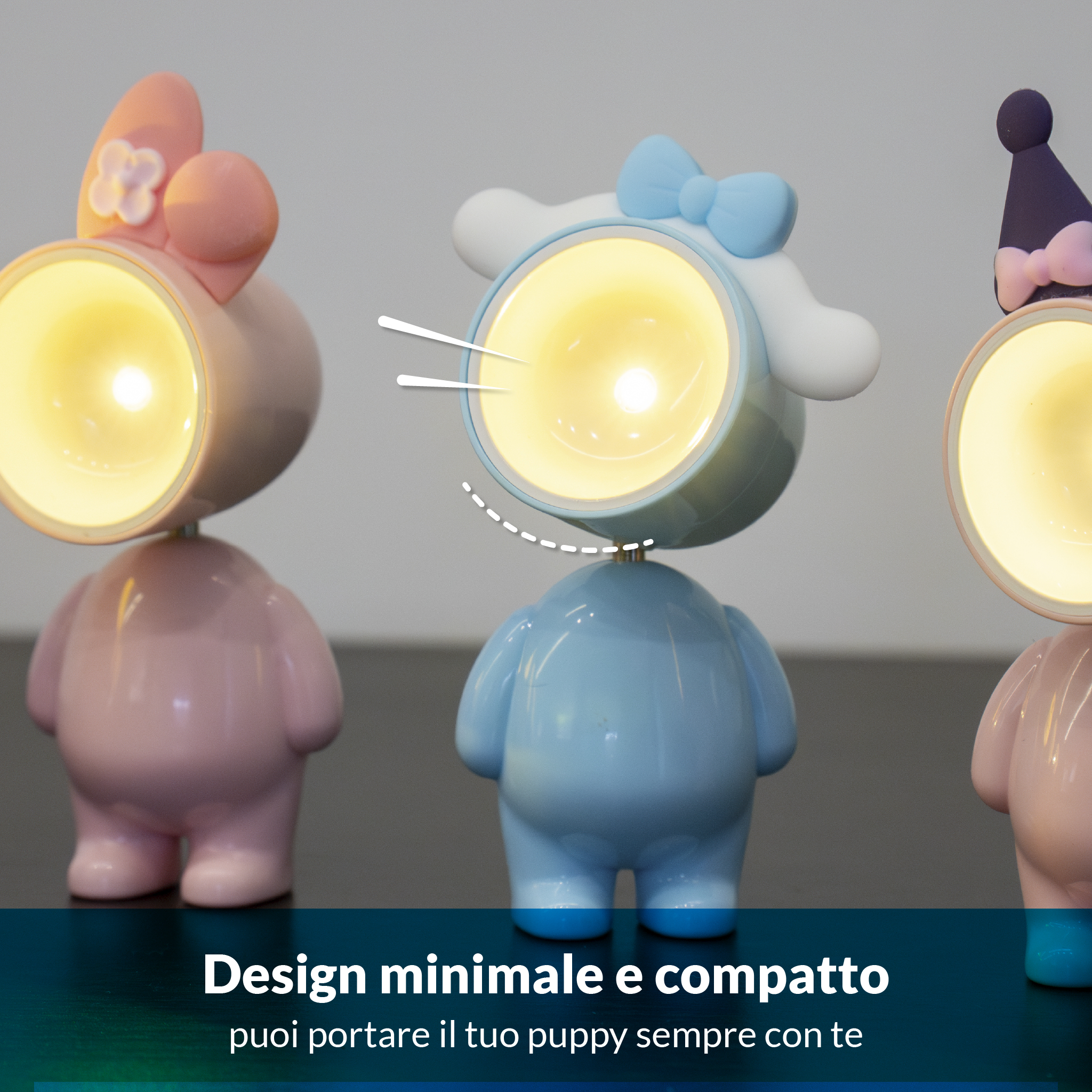 Tre simpatiche lampade a forma di personaggio dei cartoni animati rosa, blu, rosa.