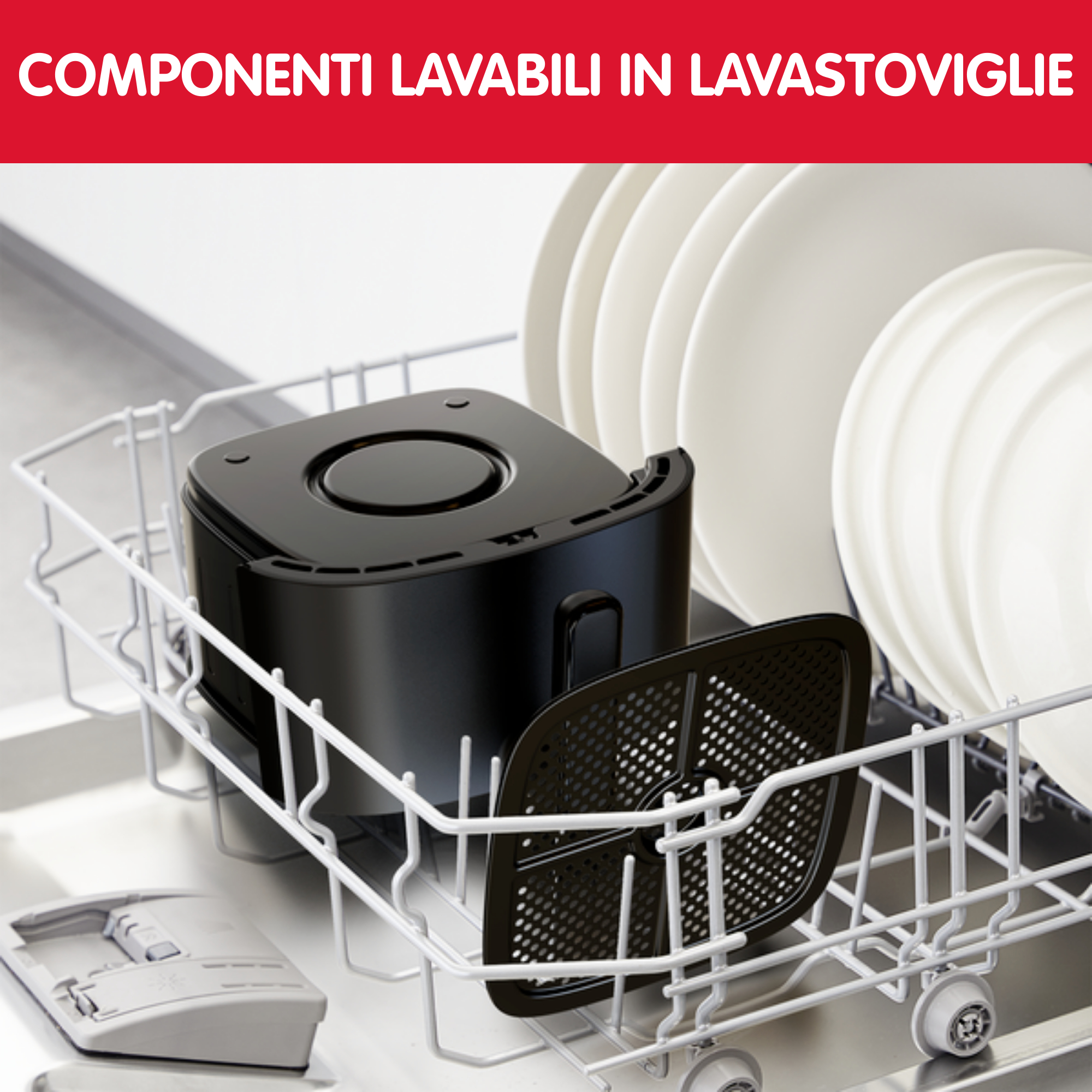 Czarny wkład do frytkownicy beztłuszczowej i białe talerze w zmywarce.