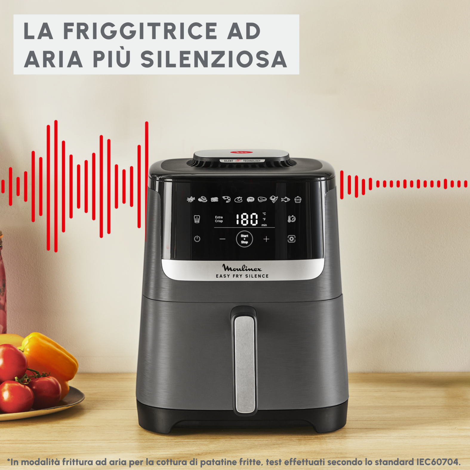 Freidora de aire Moulinex gris con controles digitales y ondas sonoras rojas.