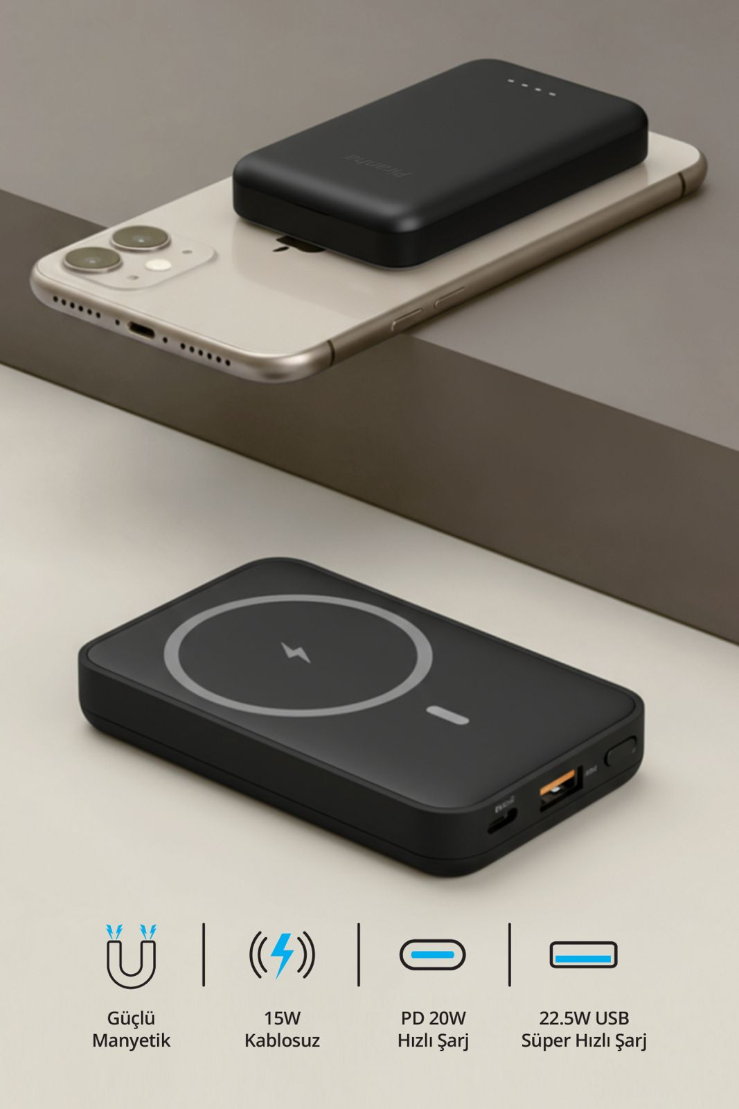 Siyah bir powerbank açık renkli bir akıllı telefonun üzerinde duruyor. Altında manyetik şarj ikonları var.
