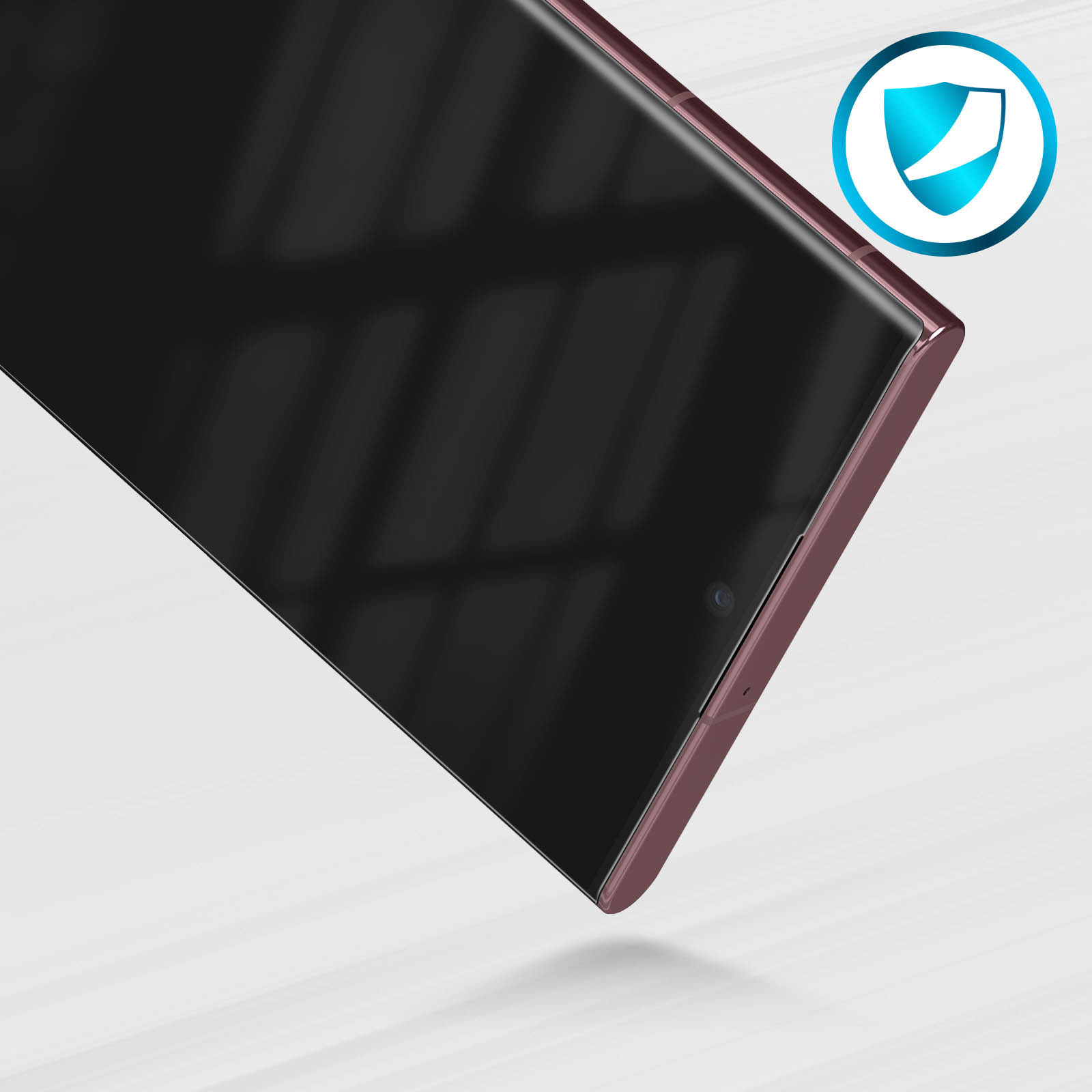 Uno smartphone color oro rosa con schermo scuro e icona di uno scudo blu.