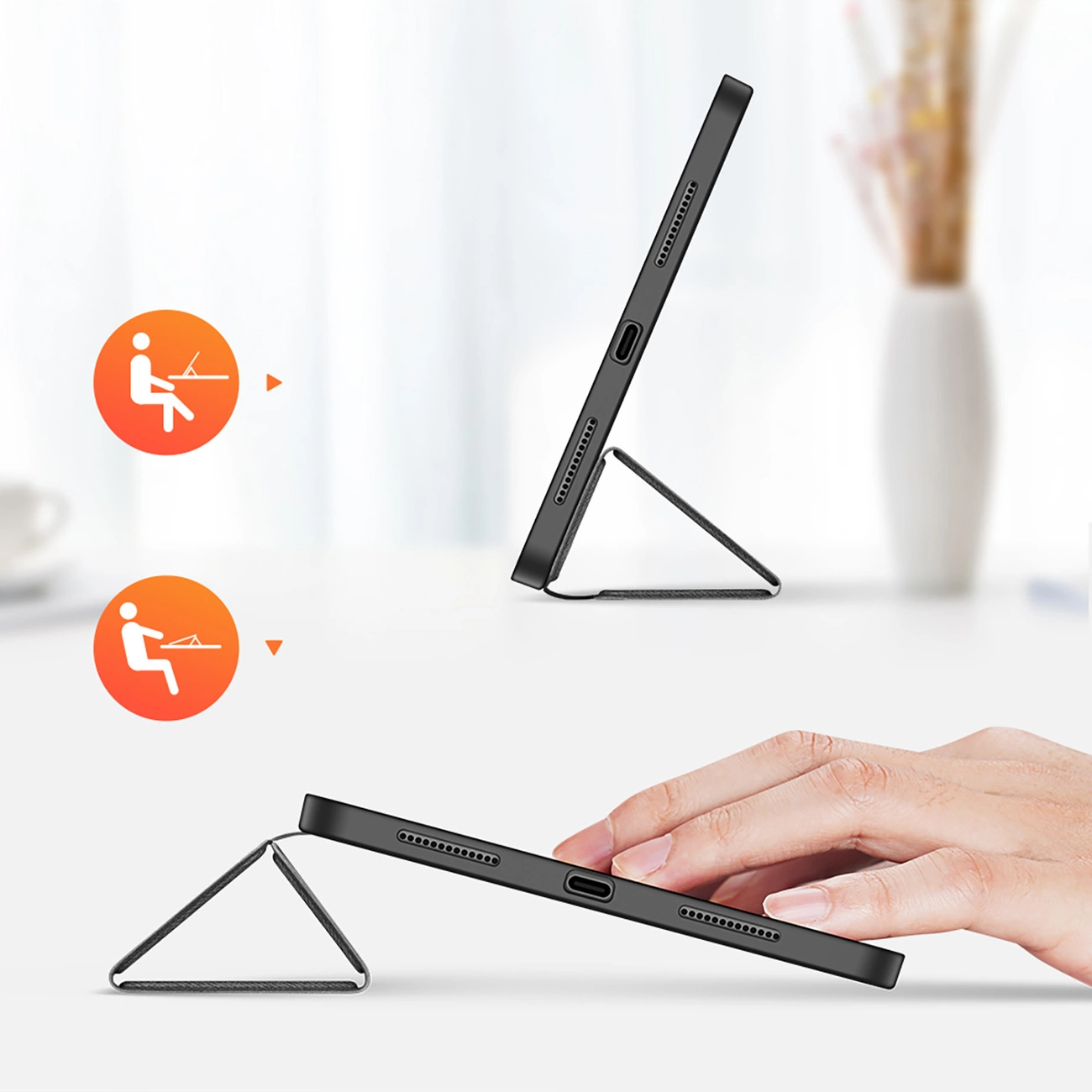 Ein schwarzes Tablet im Ständer, mit einem Symbol für die Nutzung.