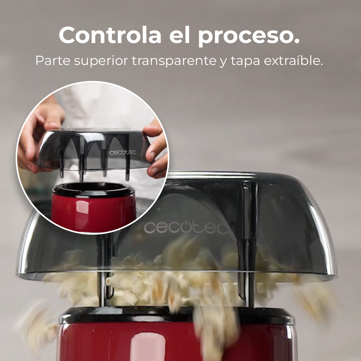 Macchina per popcorn rossa con coperchio trasparente e sportello rimovibile.