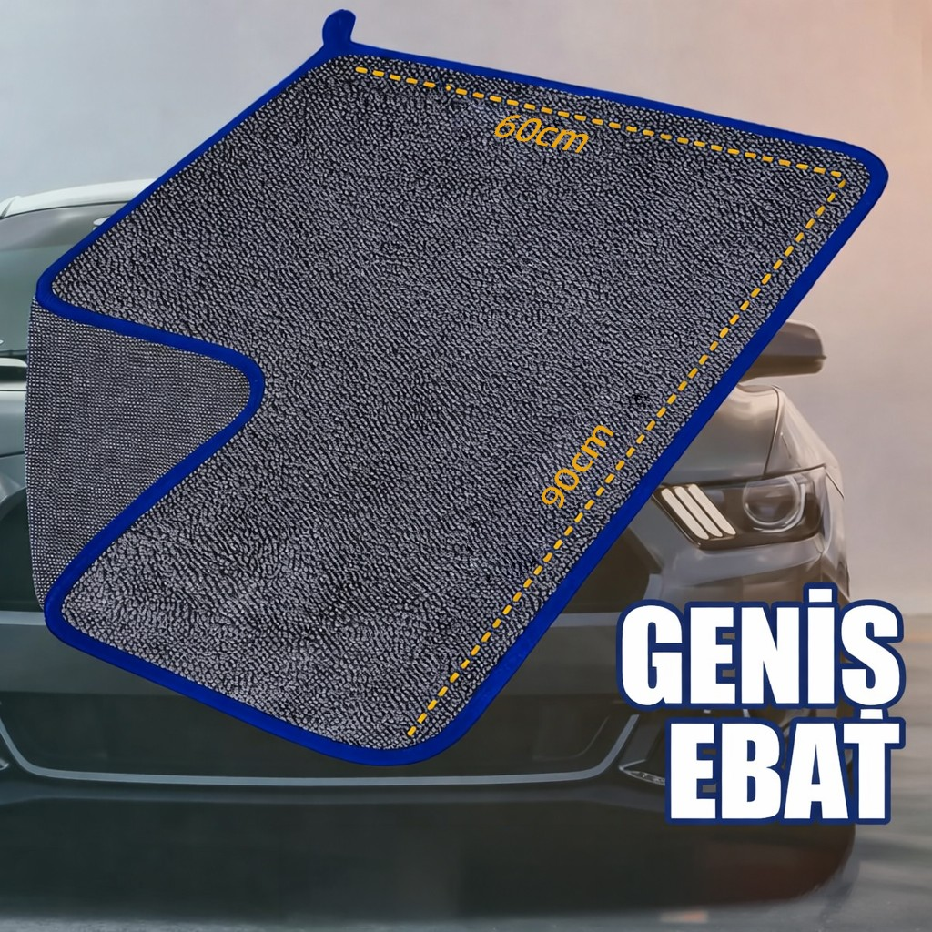 Mavi kenarlı gri mikrofiber bez, 60x90cm, bir arabanın önünde.