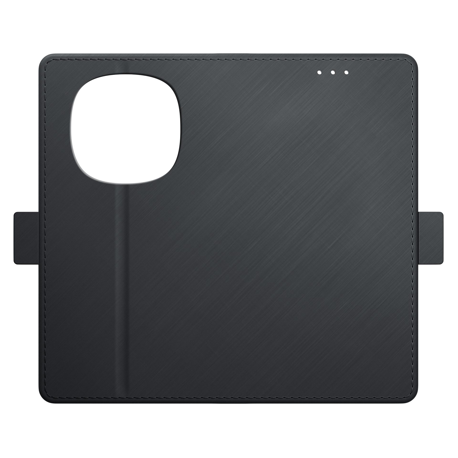 Czarna obudowa na telefon z klapką, wycięciem na aparat.