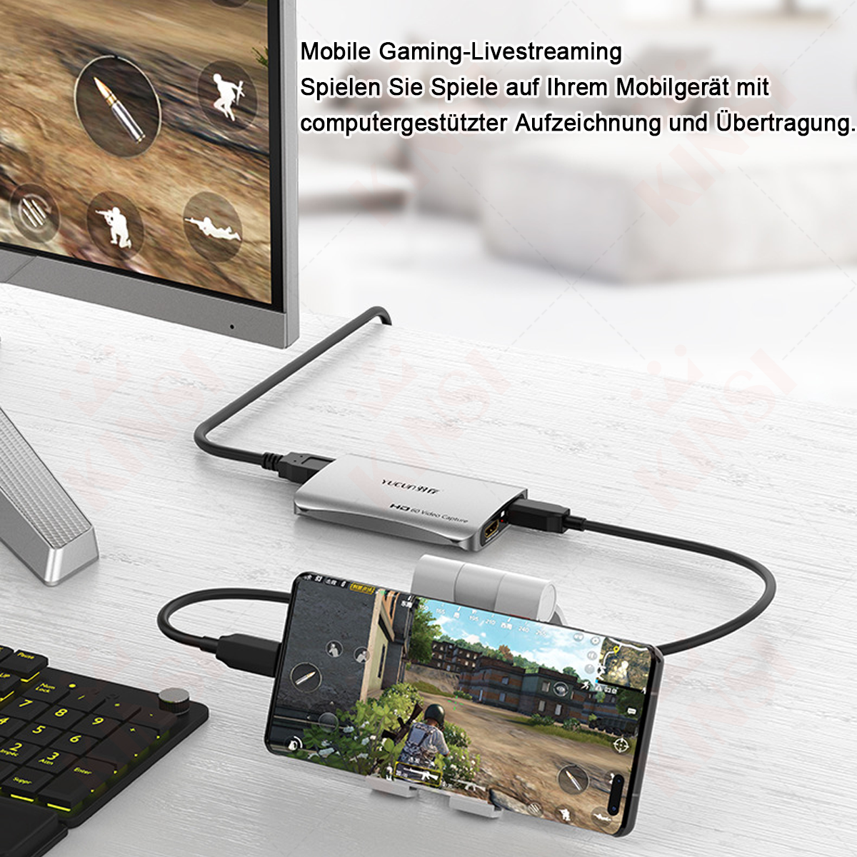 Ein Handy spielt ein Spiel, verbunden mit einem Laptop und Video-Capture-Gerät.
