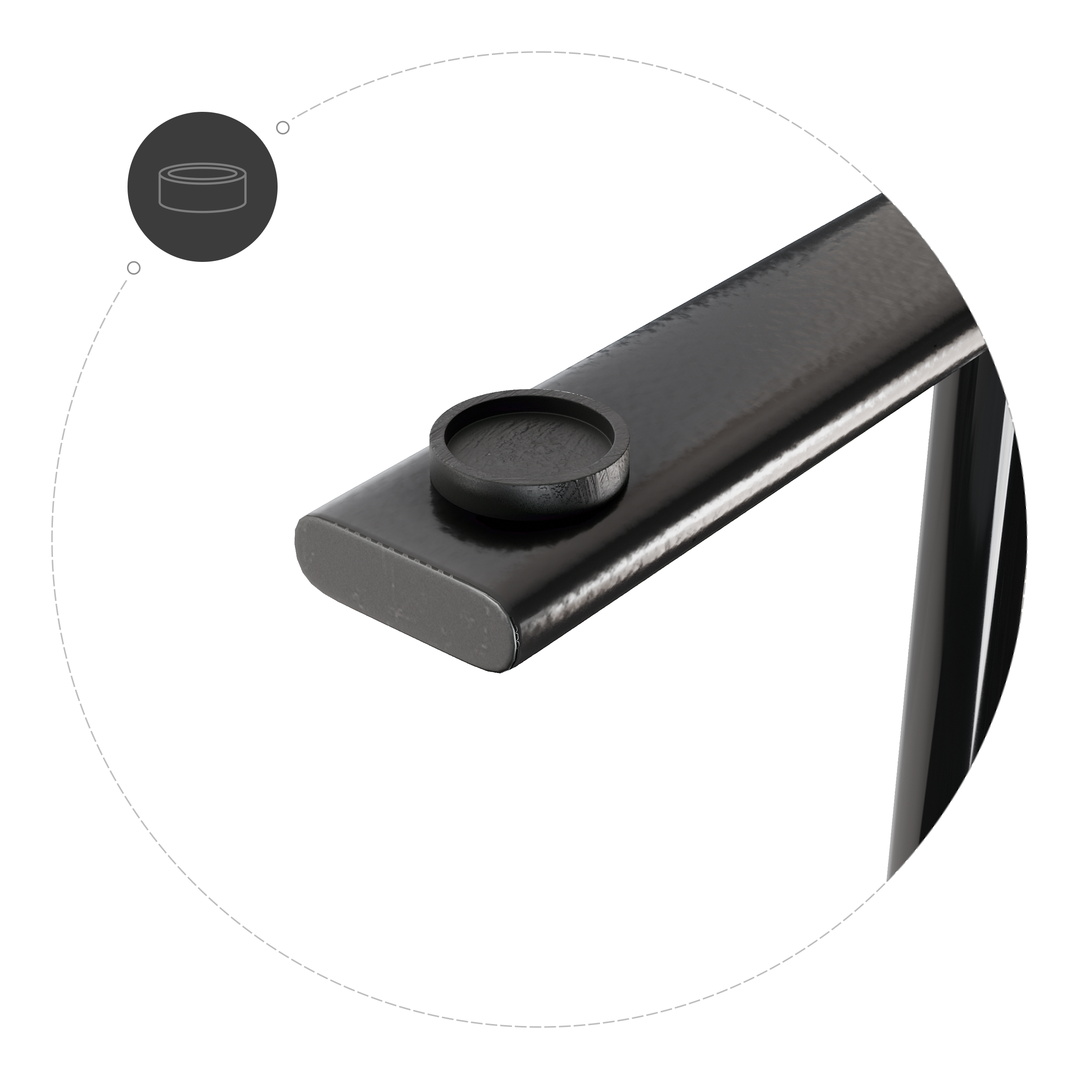 Czarny cylinder spoczywa na gładkim, czarnym prostokącie.