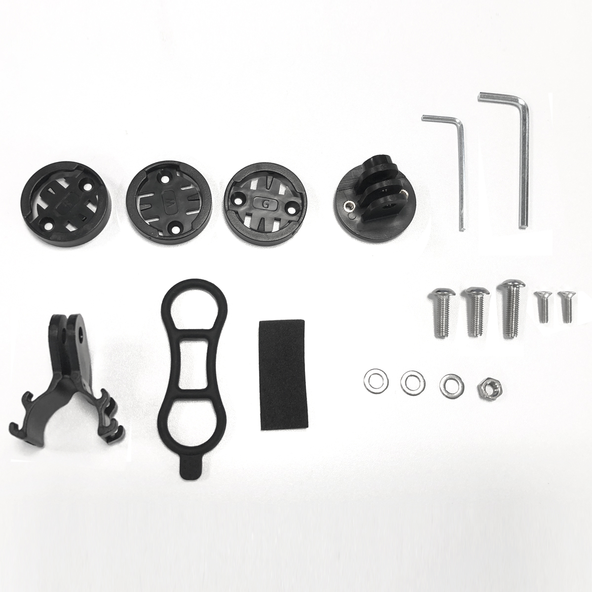 Akcesoria do mocowania roweru: uchwyty, śruby, klucze imbusowe, gumka.