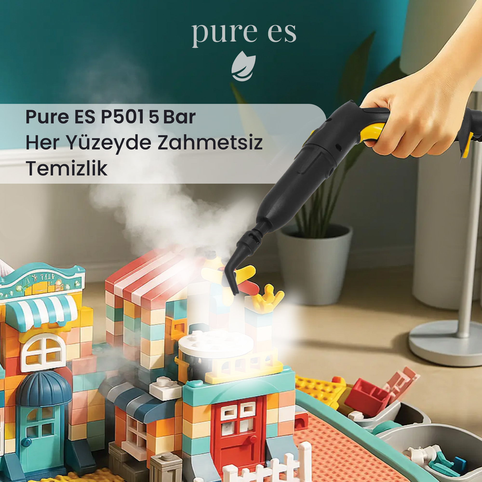 El, renkli yapı taşlarının üzerinde buharlı temizleyici tutuyor.