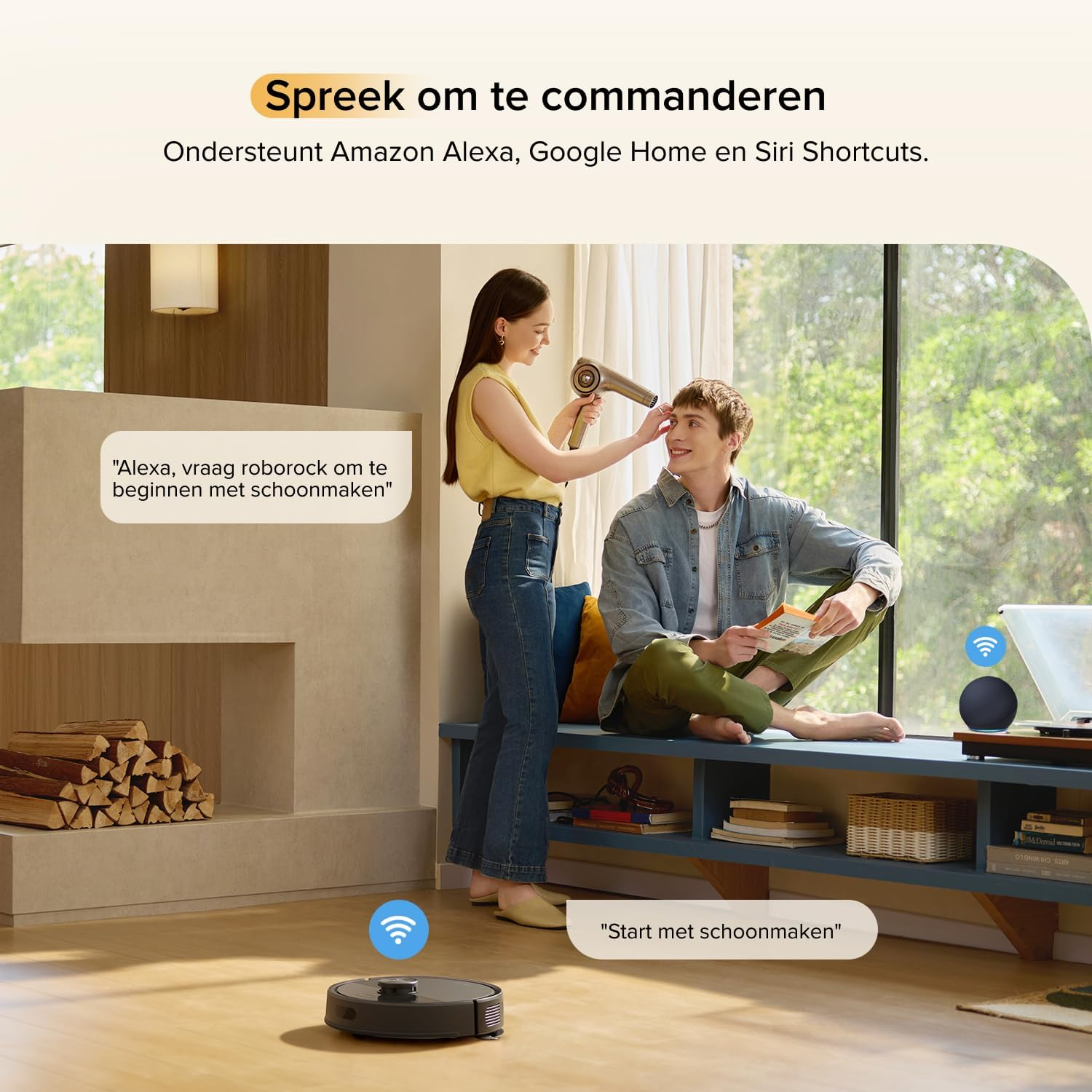 Un couple qui interagit : Elle le sèche au sèche-cheveux pendant qu'un aspirateur robot nettoie.
