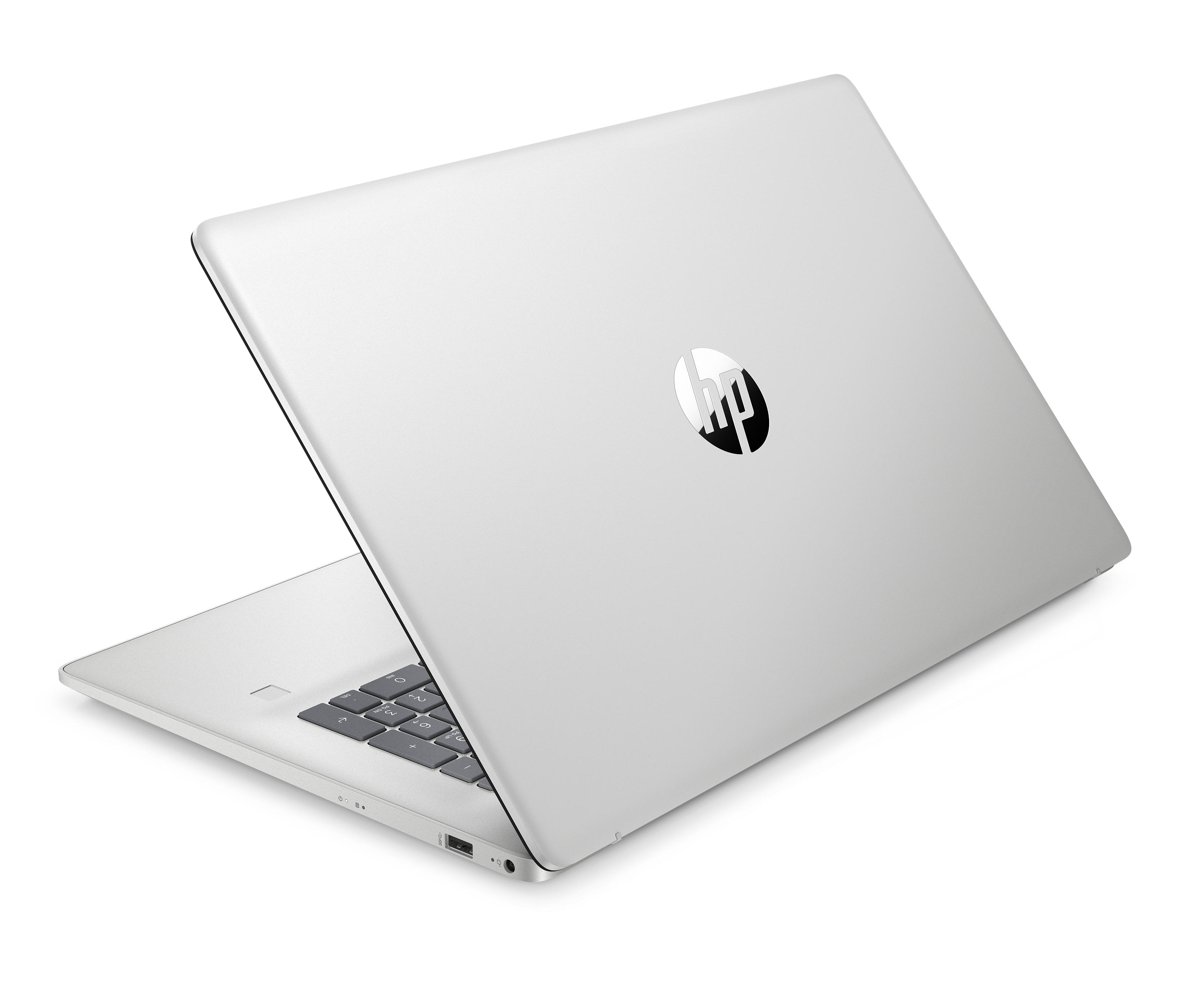 Srebrny laptop HP z zamkniętą pokrywą, widoczne logo.