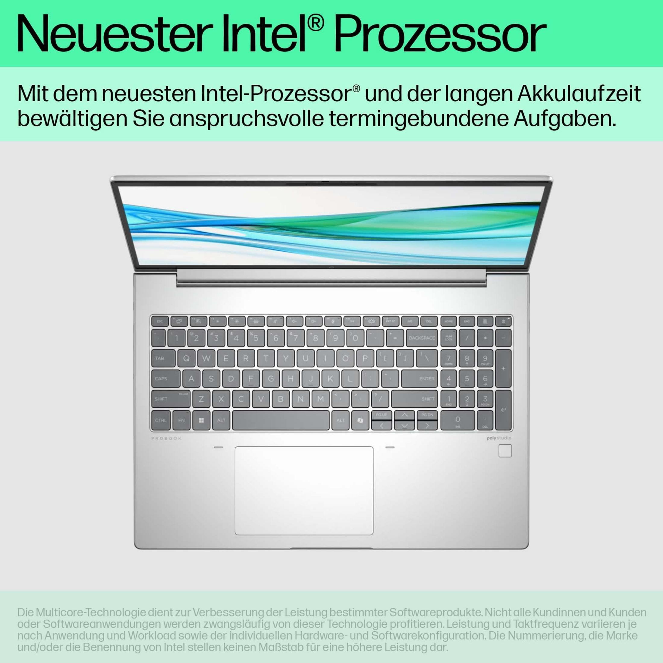 Otwarty laptop z tekstem reklamowym procesora Intel i klawiaturą.