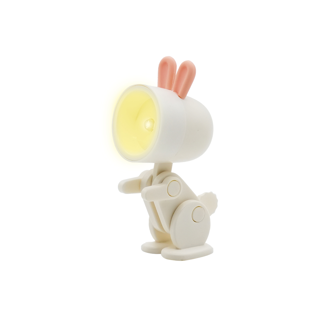 Piccola lampada bianca a forma di coniglietto, orecchie rosa, luce gialla.